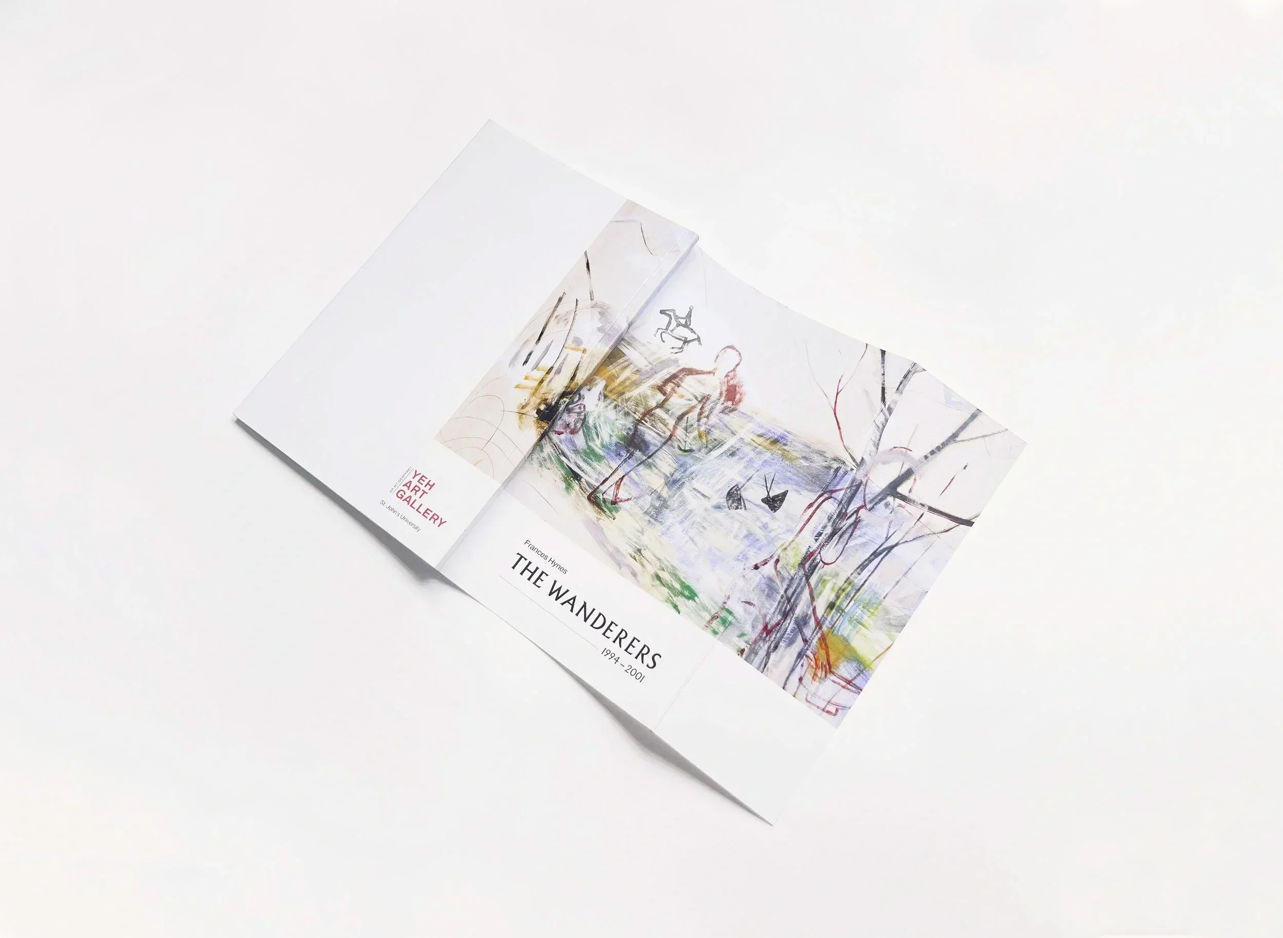 Open brochure displaying the artwork 'The Wanderers' by Frances Hyne, featuring colorful abstract trees and figures, with text indicating the artwork's title and artist.