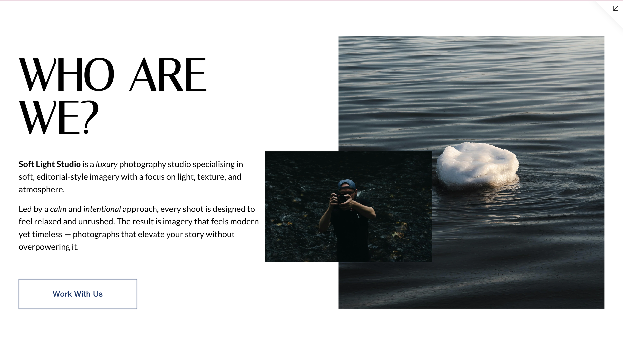 A webpage layout with a large text heading 'Who Are We?' on the left, a paragraph describing Soft Light Studio as a luxury photography studio, a button labeled 'Work With Us,' and on the right, an image of a person taking a photograph in water, with a separate smaller image of a floating ice formation on water.