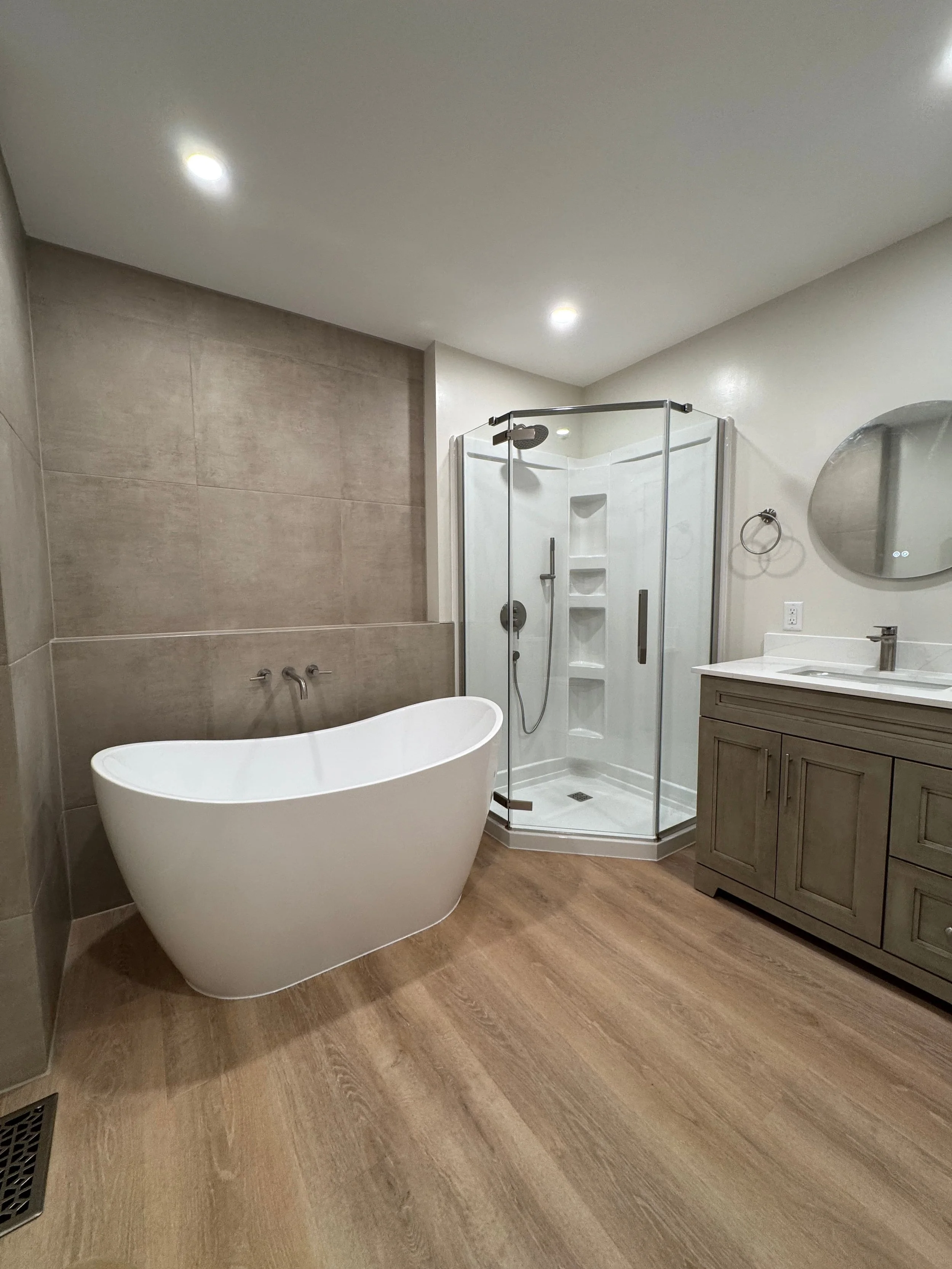 Ensuite bathroom renovation in Ottawa, Riverside south with freestanding tub and walk-in glass shower