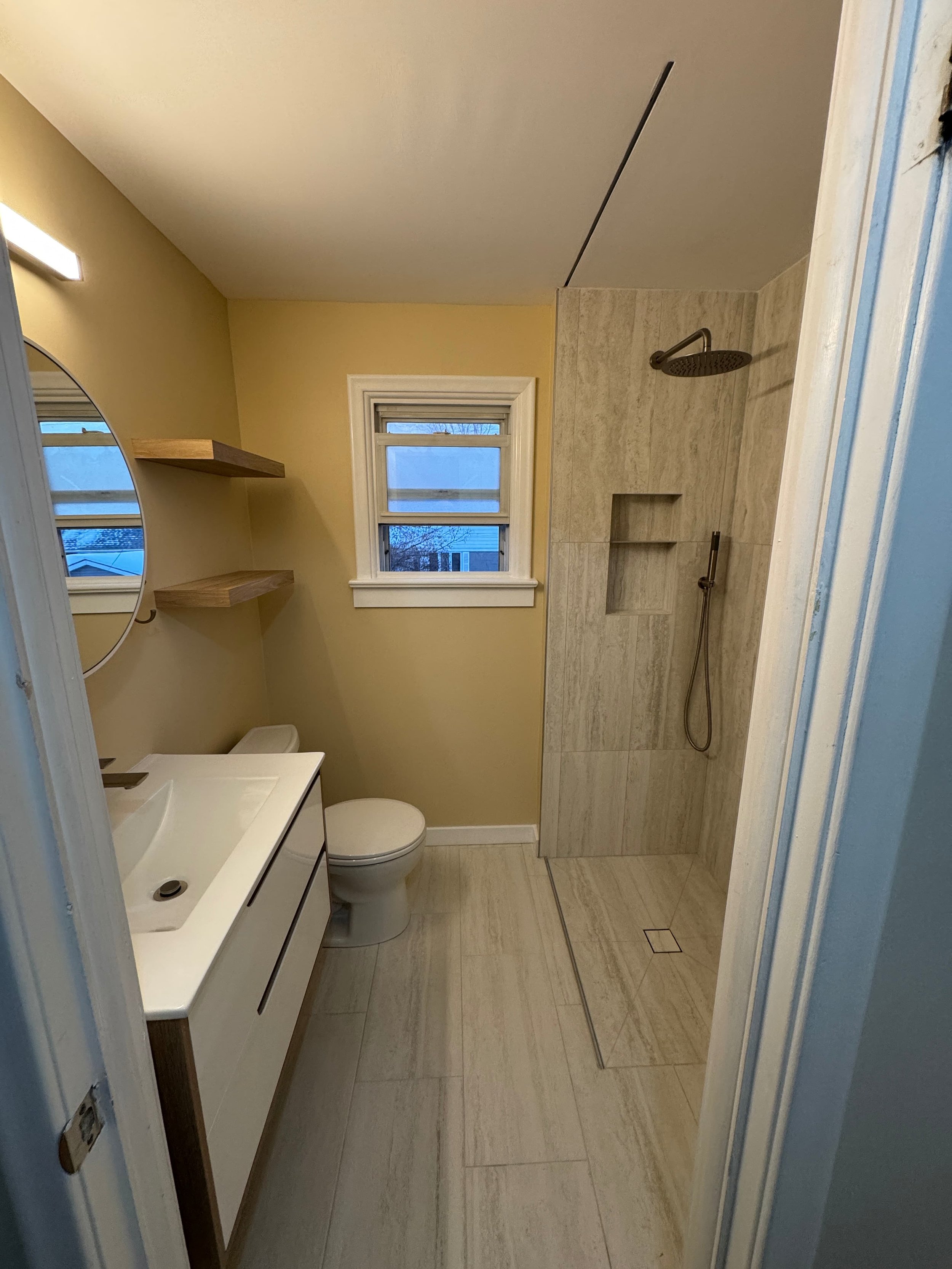 Small bathroom renovation in Ottawa, Trainyards featuring modern vanity, sink, and updated layout