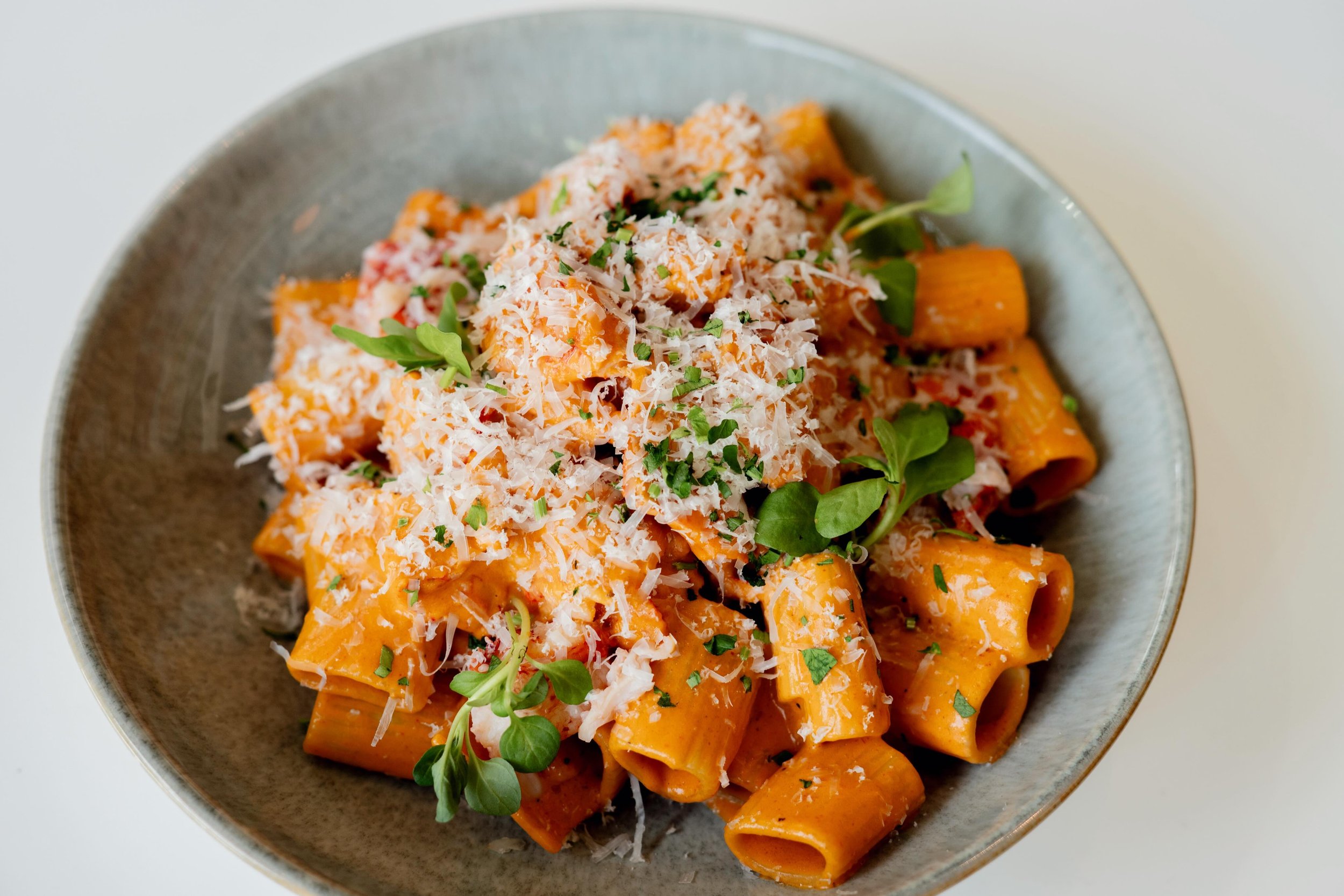 Our new menu is officially here 🍷 Join us tonight for new cocktails, appetizers, pasta dishes, pizzas, sandwiches, and more.

Pictured: Lobster Ros&eacute; Rigatoni with spicy roasted red pepper lobster cream sauce