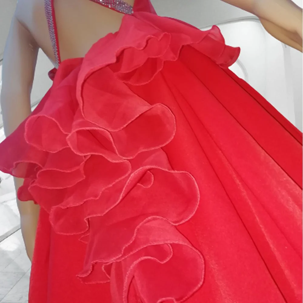 Intricate hand-stitched detail of a bespoke red carpet gown, engineered in Elena Milani’s Burnham-on-Crouch studio using Italian tailoring precision for gala and BAFTA-level events