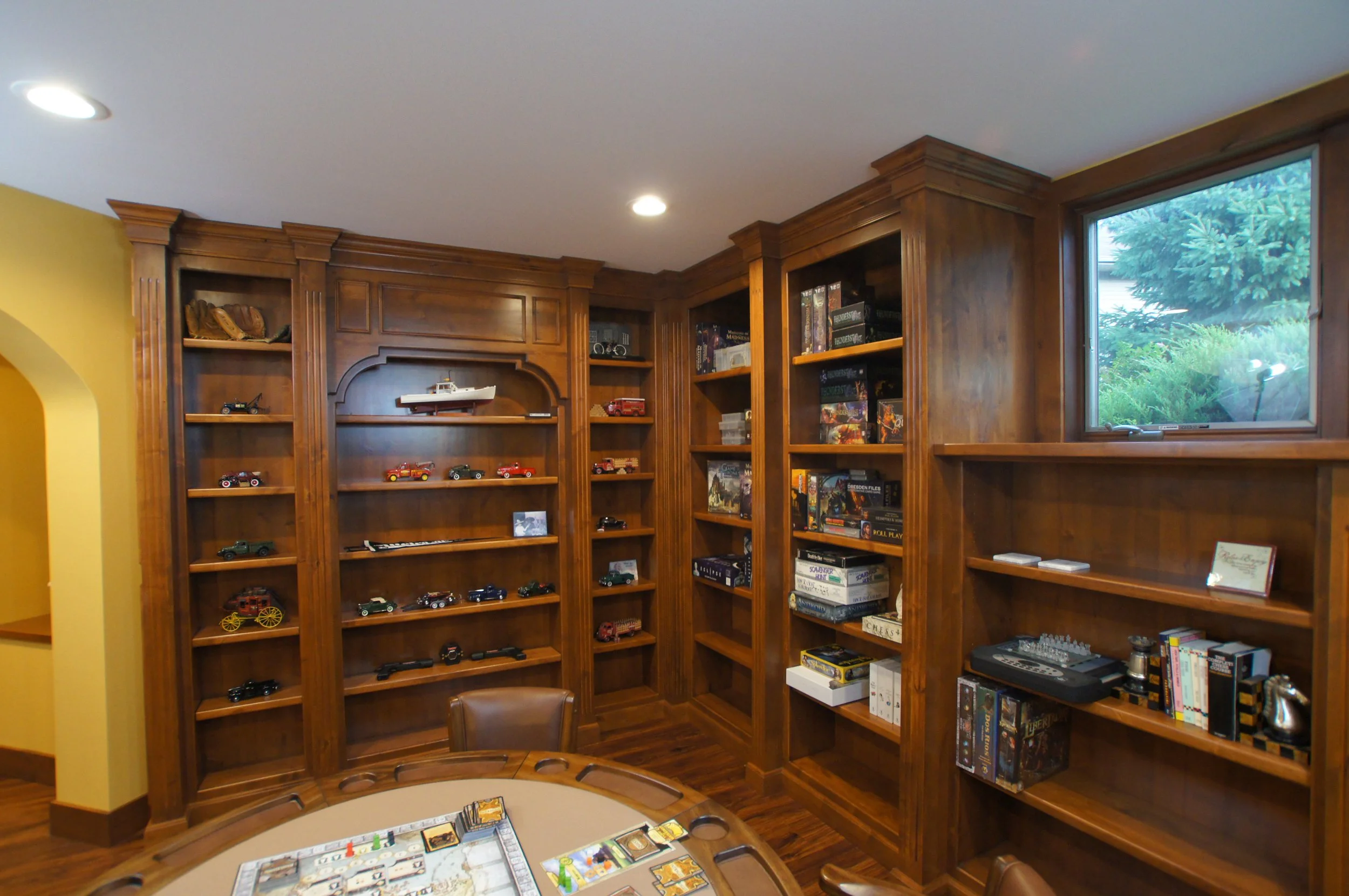 Custom cabinetry allowed us to turn this bookcase into a hidden door.