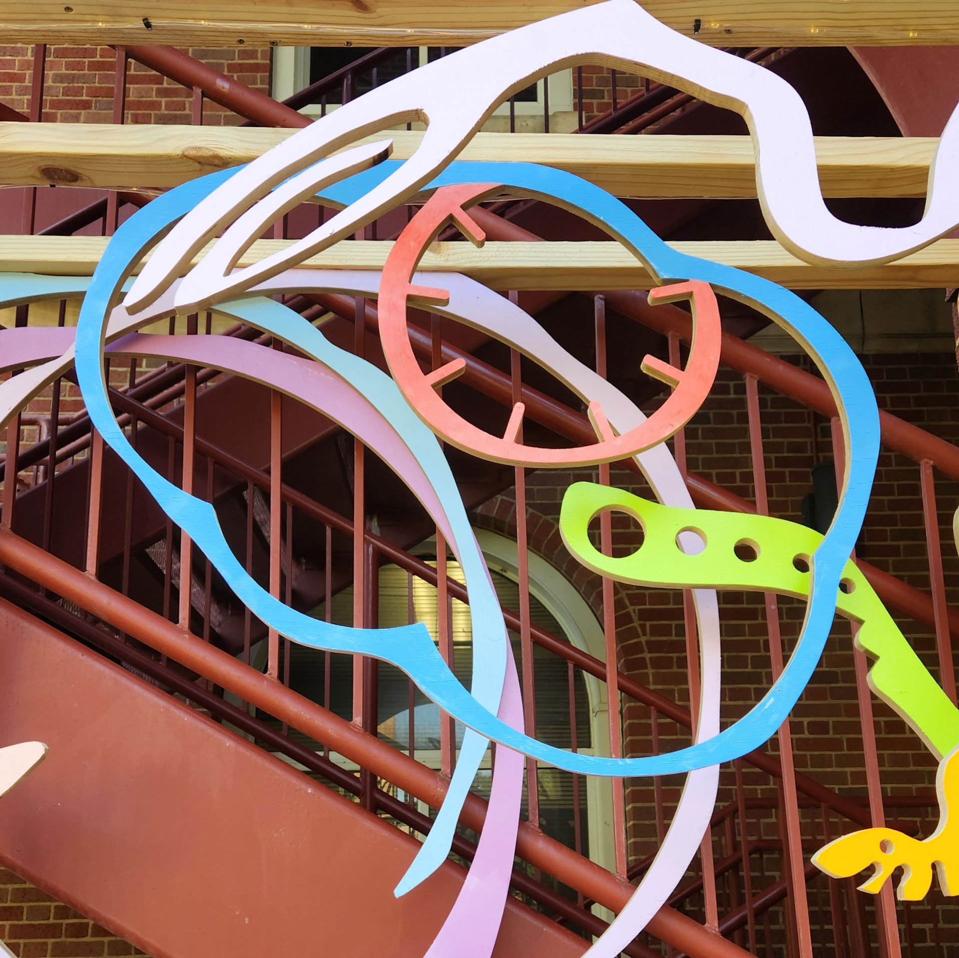 Joy Stop, 2025. Plywood, OSB, latex paint, solar lights, music box – 112 x 68 x 21 in.