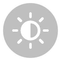 Icon of a sun with rays, half shaded, on a black background.