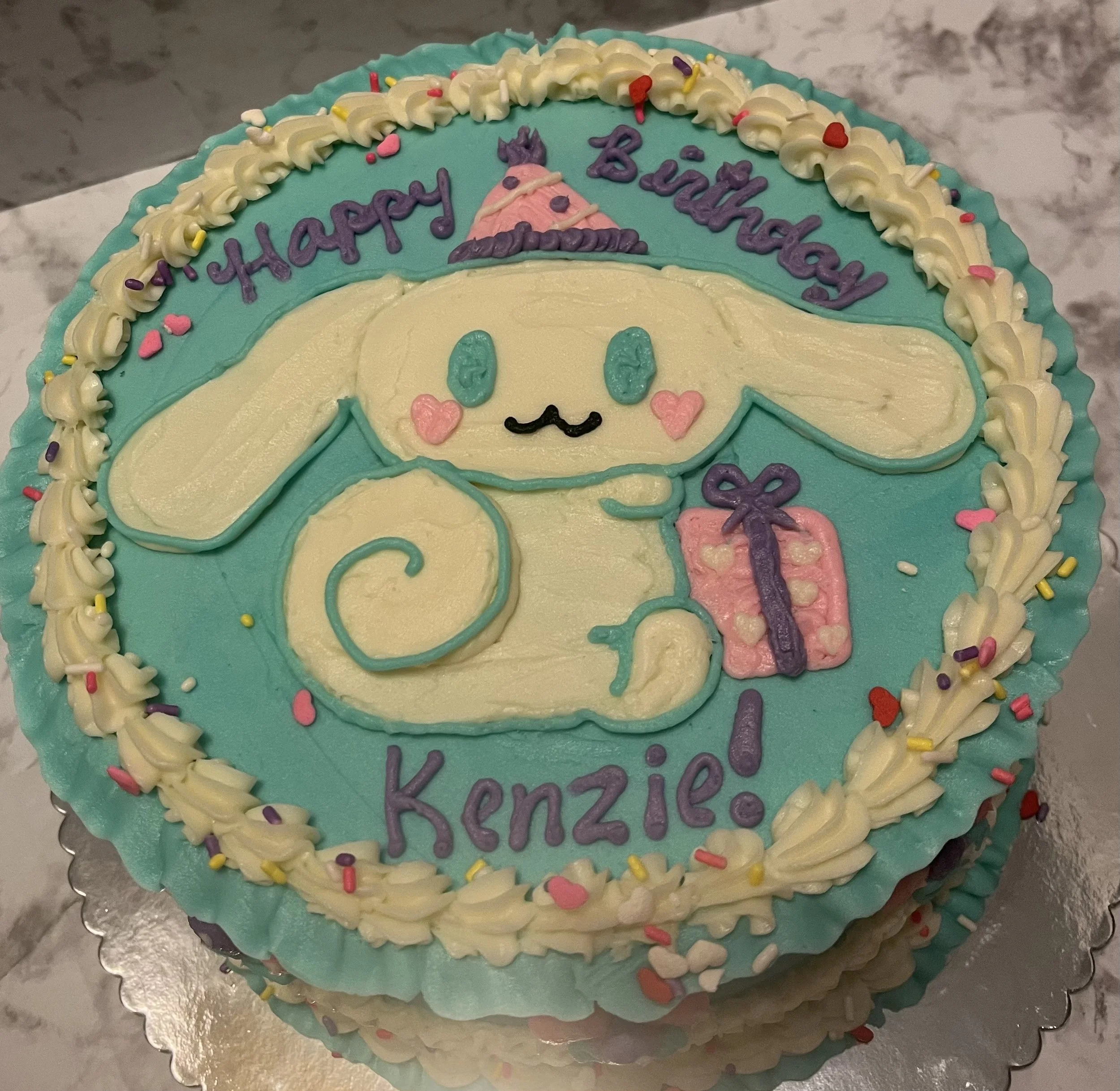 cinnamon roll birthday cake.jpeg