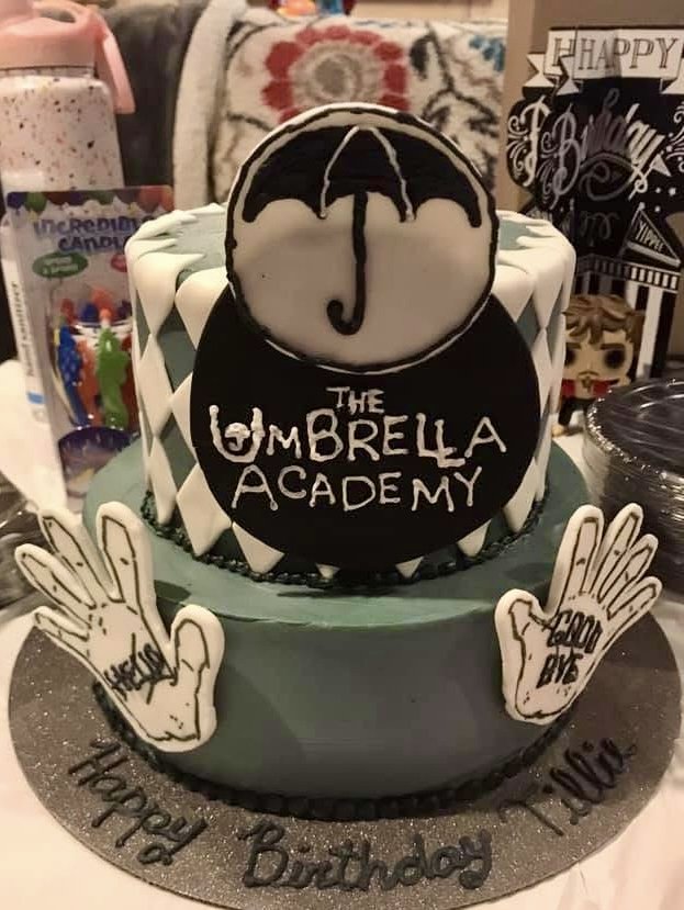 2 tier umbrella academy cake.jpg