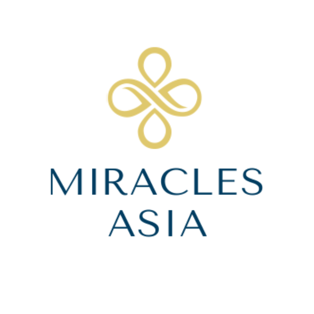 Miracles Asia logo featuring a gold decorative symbol above the text 'Miracles Asia' in navy blue.