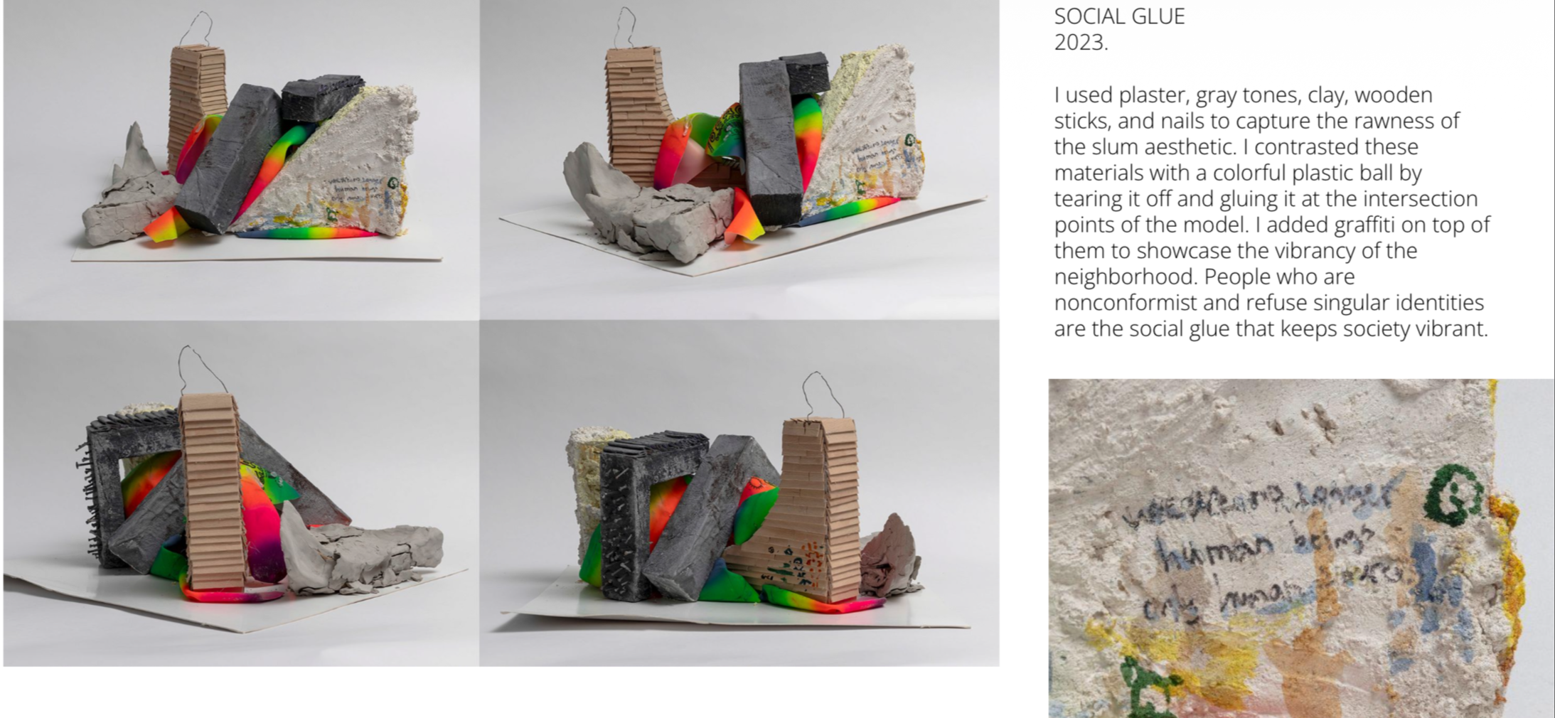 Mixed media art piece with plaster, gray tones, clay, wooden sticks, and nails contrasted with colorful plastic ball, graffiti, and handwritten text on a textured surface.