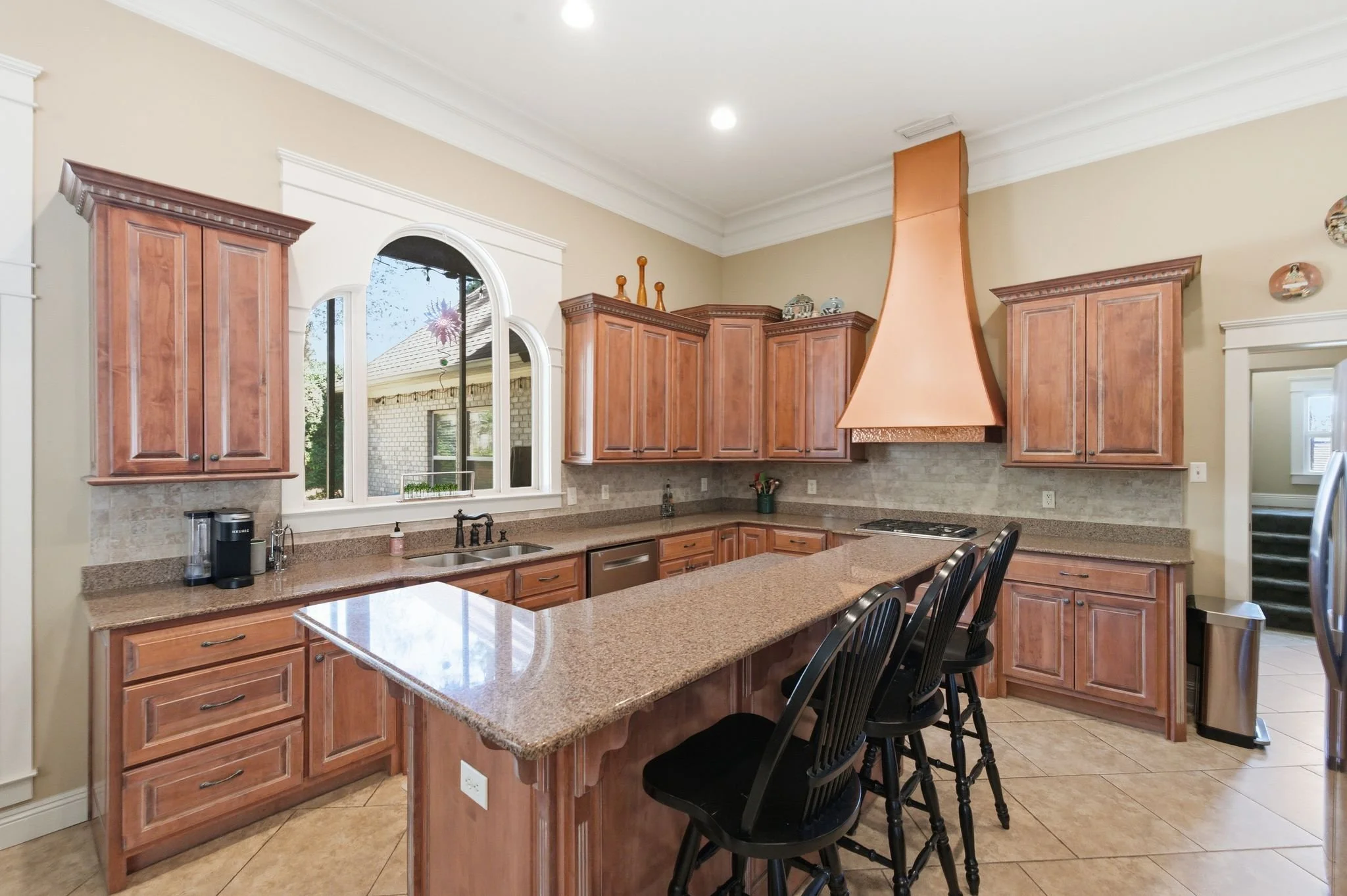 Spanish Fort French Provincial style home in Stillwater