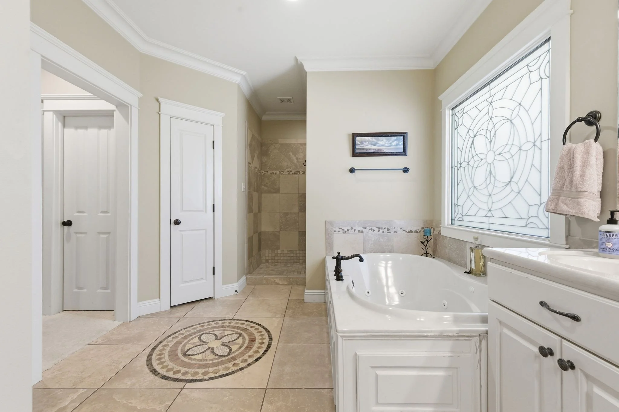 Spanish Fort French Provincial style home in Stillwater