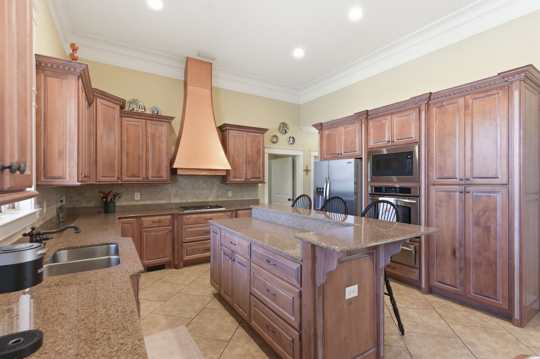 Spanish Fort French Provincial style home in Stillwater