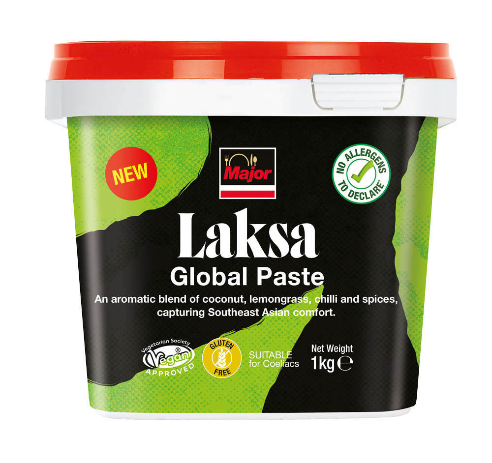 A container of Major Laksa Global Paste, with a black and green label. The label features the Major logo, a red 'New' badge, and icons indicating vegan approval, gluten-free, and suitable for coeliac. The net weight is 1 kilogram.