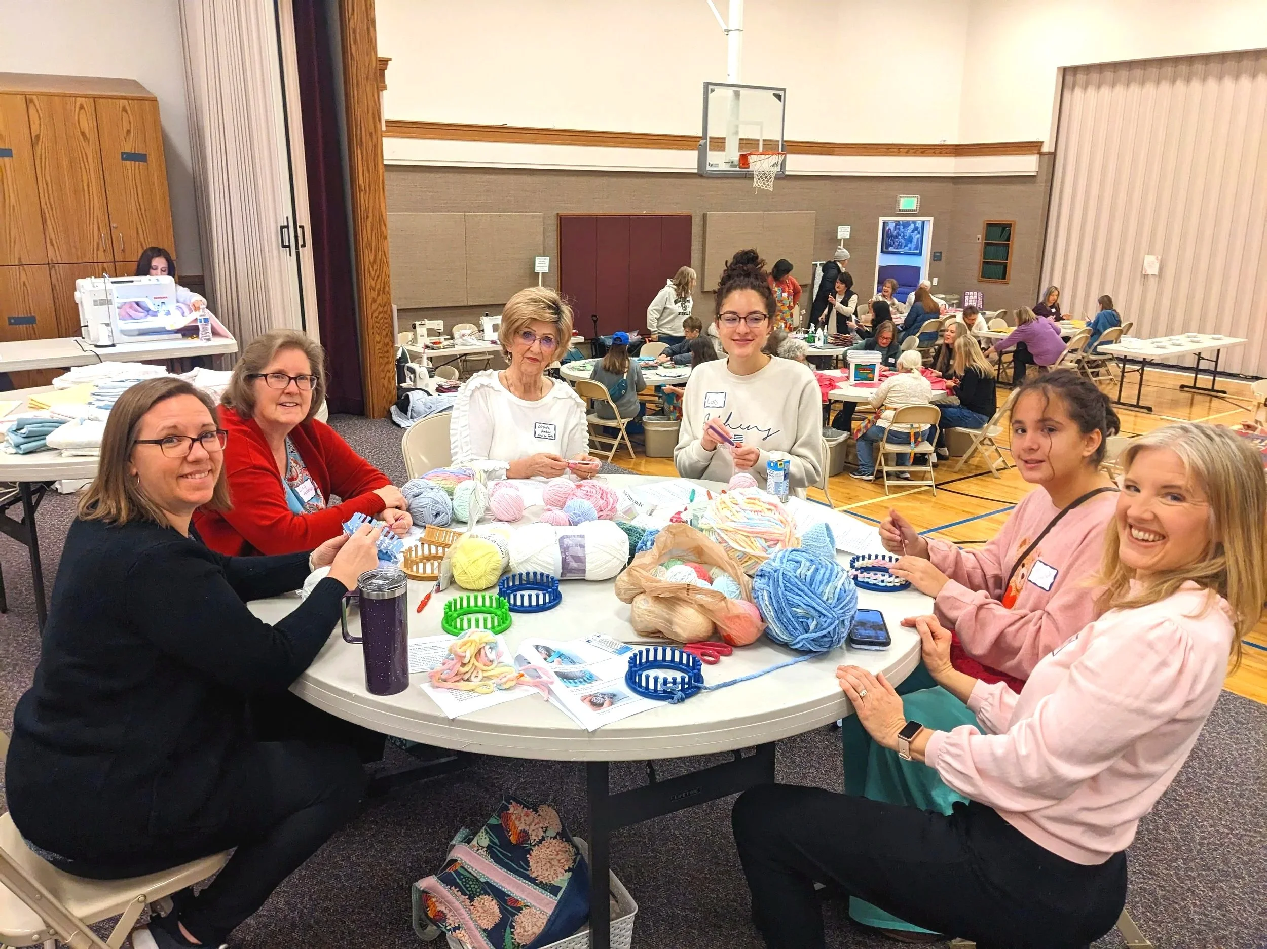 8143+-+Meridian+Church+Group+making+blankets+and+hats+for+St+Lukes+all+ages+2+PXL_20260124_173619407.MP.jpg