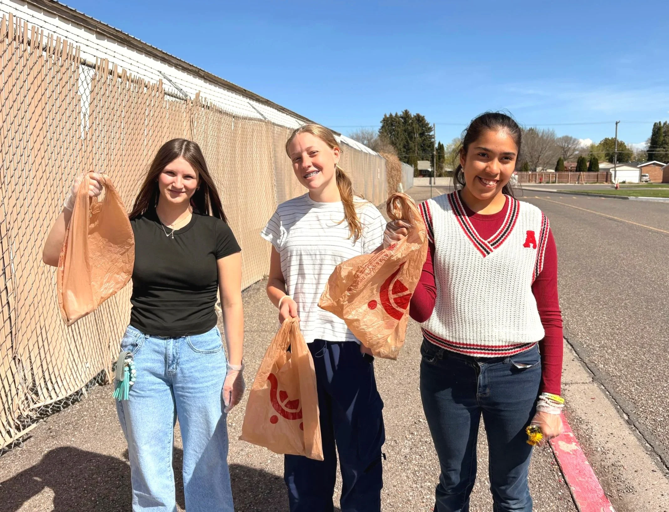 9011+-+Burley+High+School+students+cleaning+America250+Idaho+2+clean%2Bup.jpg