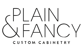 Plain & Fancy Custom Cabinetry logo with stylized text
