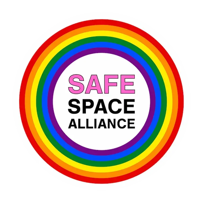 Safe Space Alliance logo with the words inside a rainbow circle.