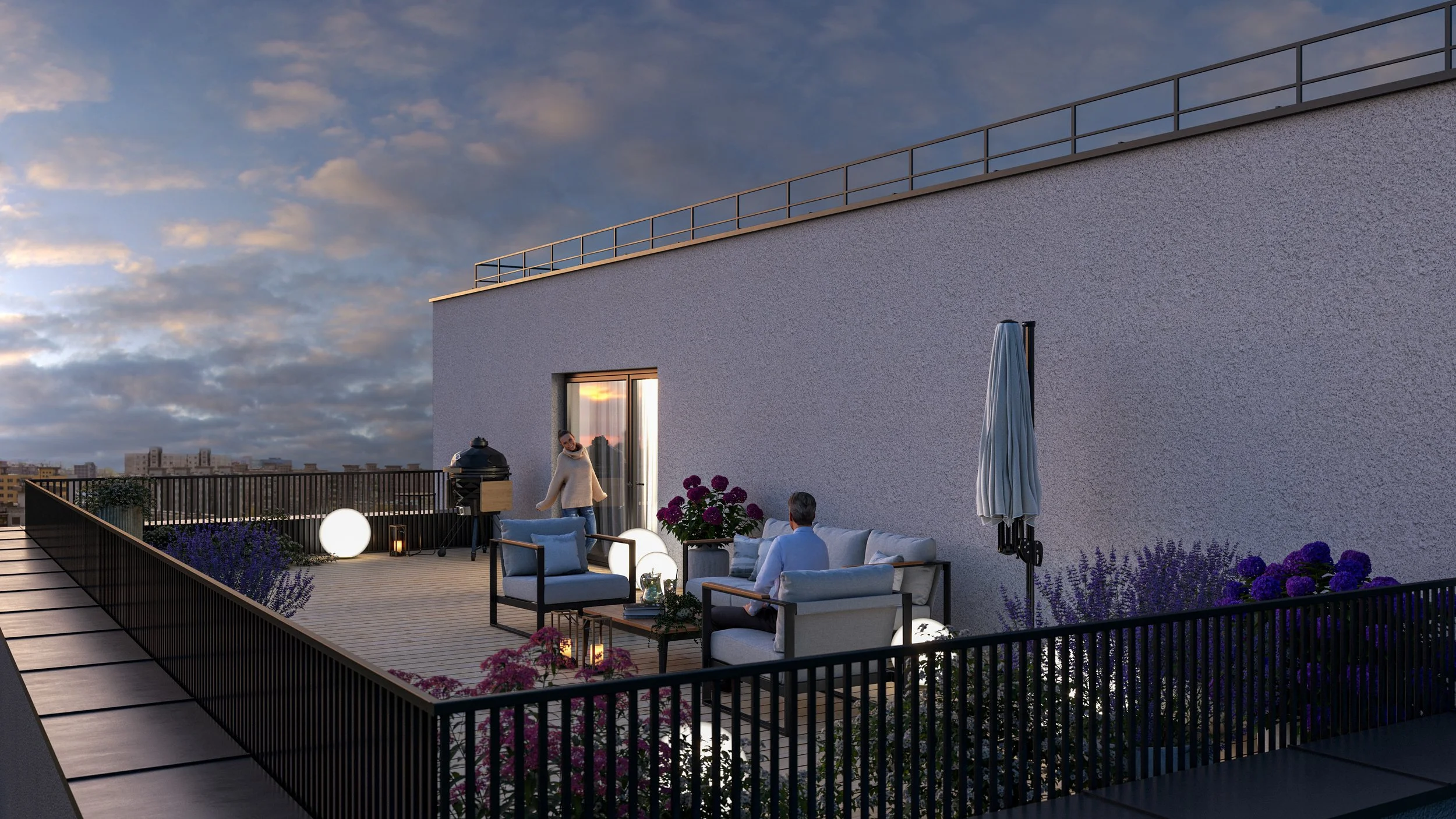 Rooftop terrace with outdoor seating, potted plants, string lights, and a couple chatting, during sunset with cloudy sky.