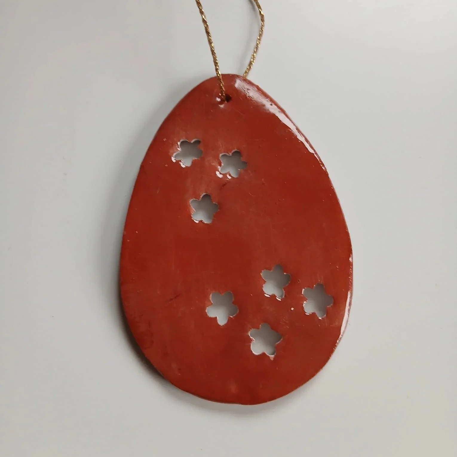 Egg+with+cutout+flowers+-+Terracotta+-+back.jpg
