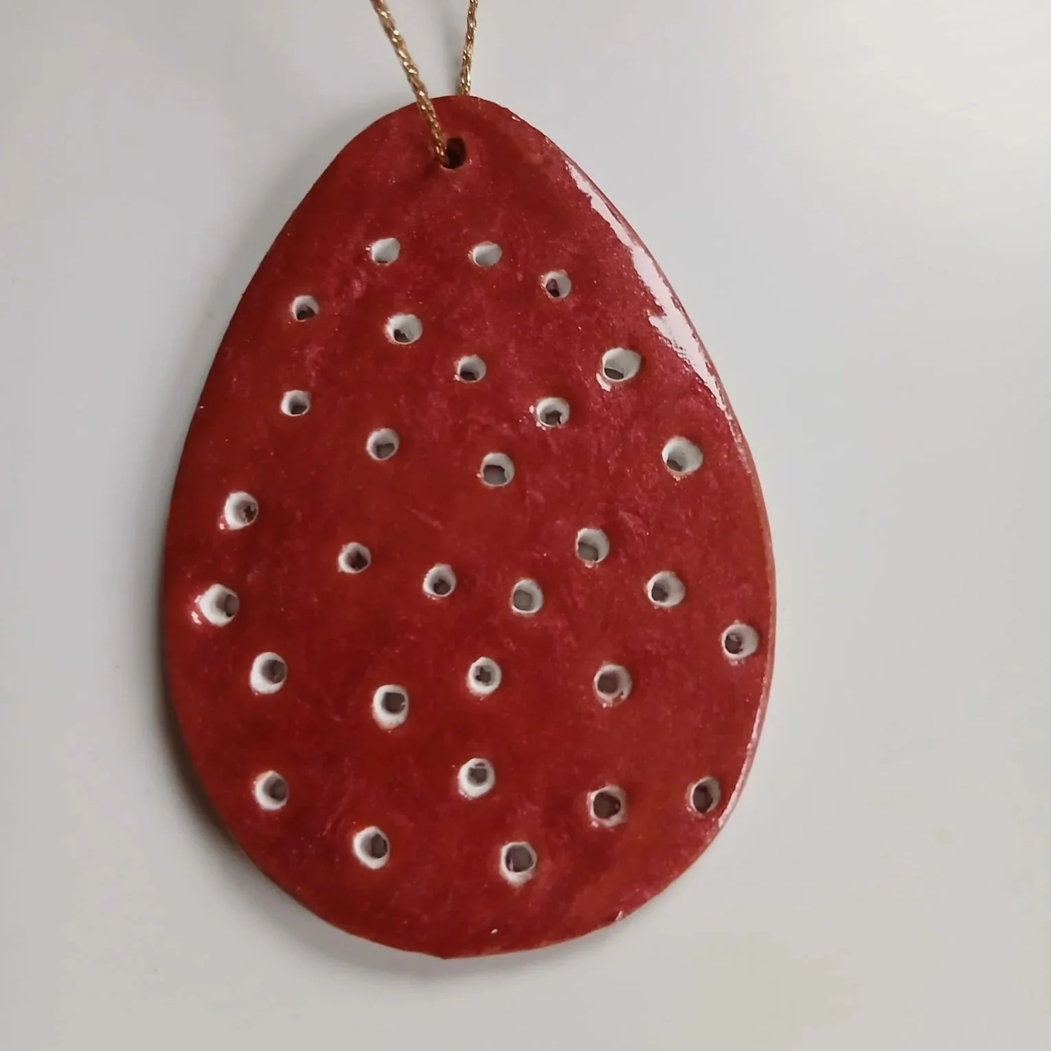Egg+with+cutout+dots+-+Terracotta+-+Front.jpg