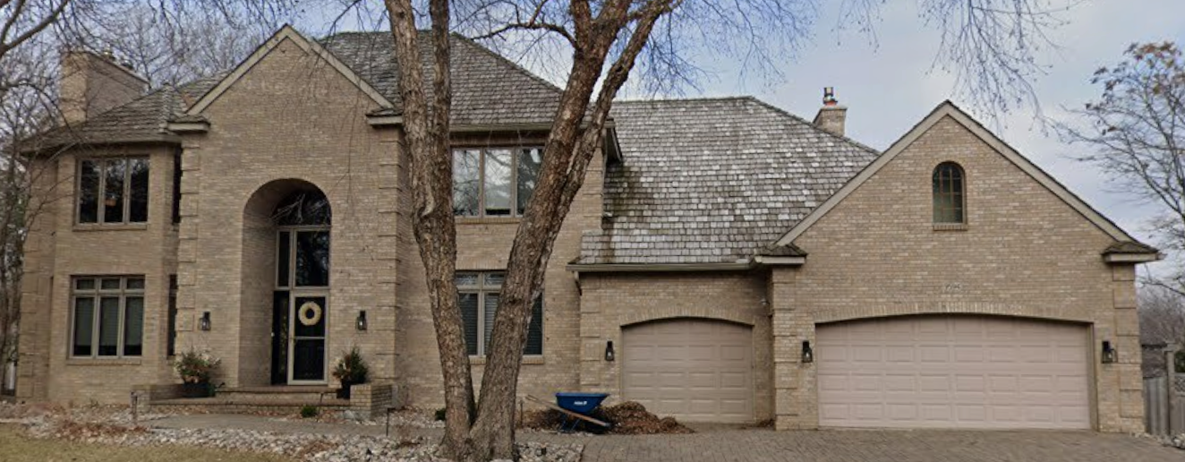 Brick traditional home, West Metro