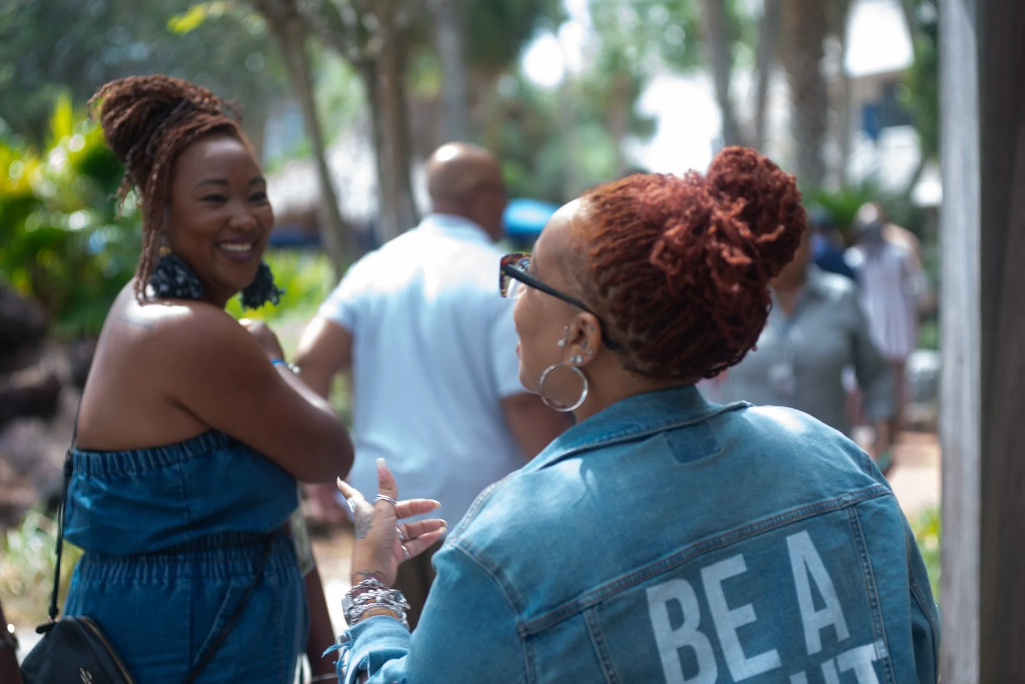 Marriage retreat speakers sharing a joyful moment during a Lead in Love teaching session