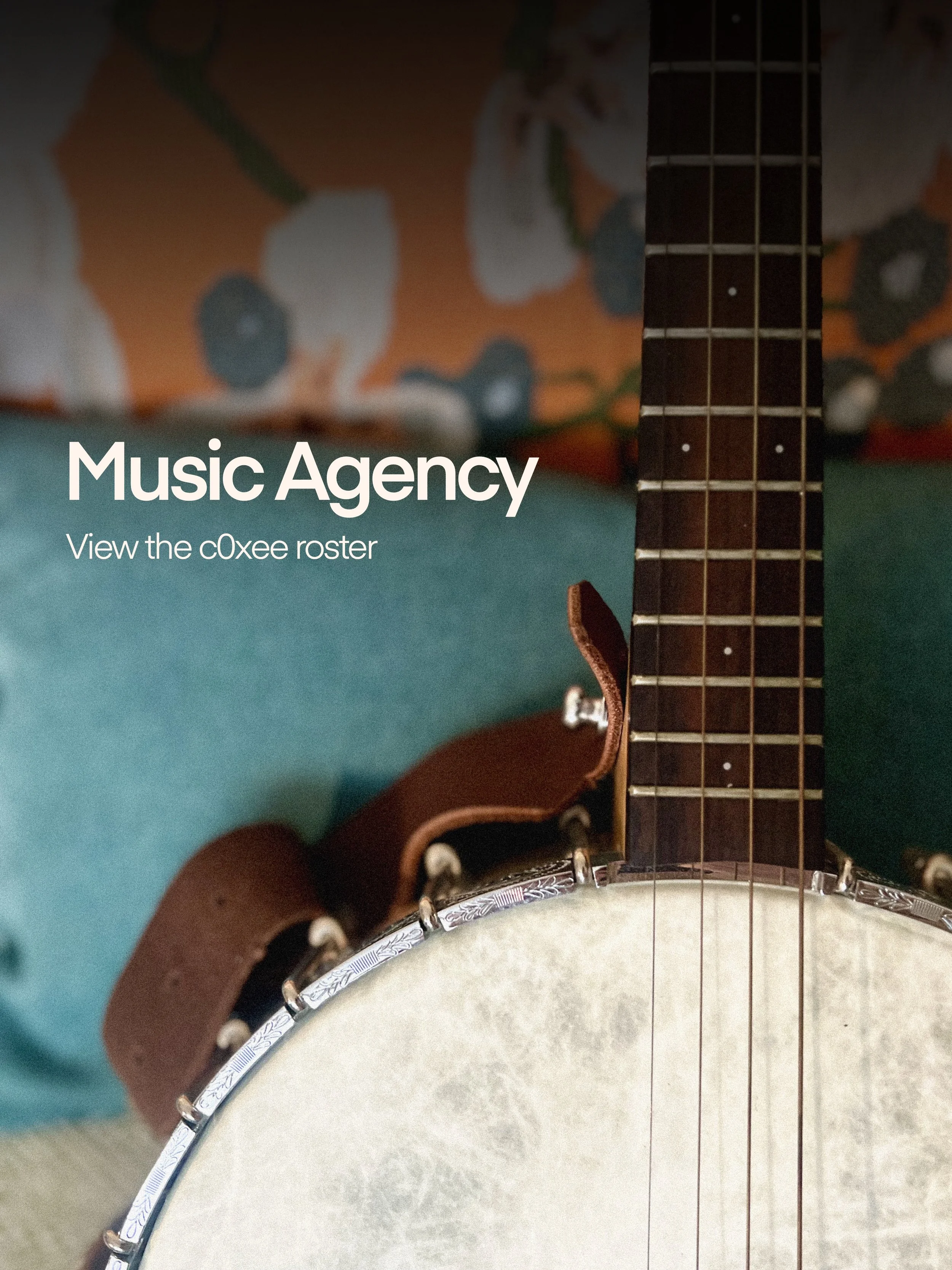 Close-up of a banjo's body and neck with text overlay reading 'Music Agency, View the coXee roster.'