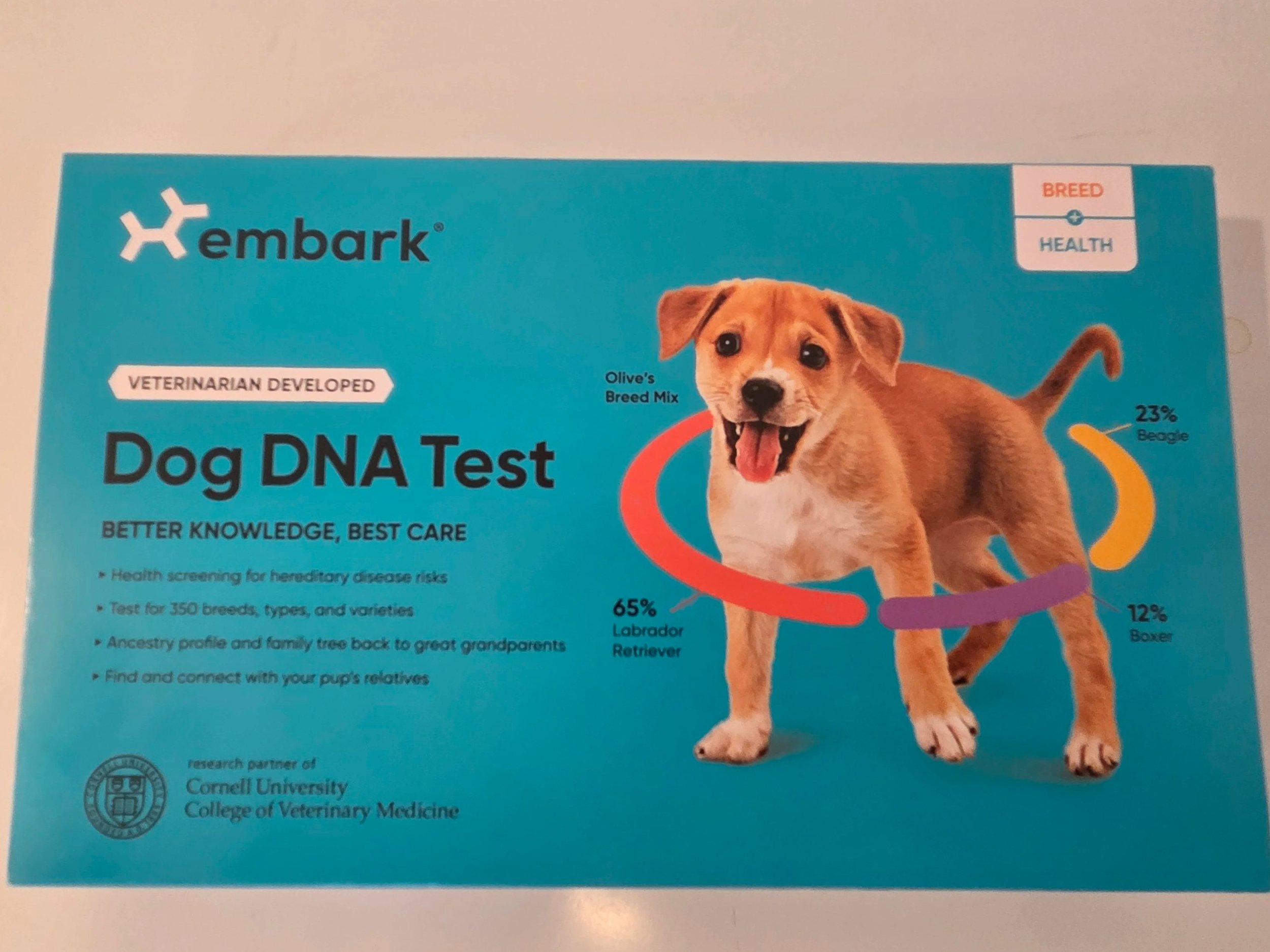 Charlie's official Embark DNA health screening kit box at Ironstone.
