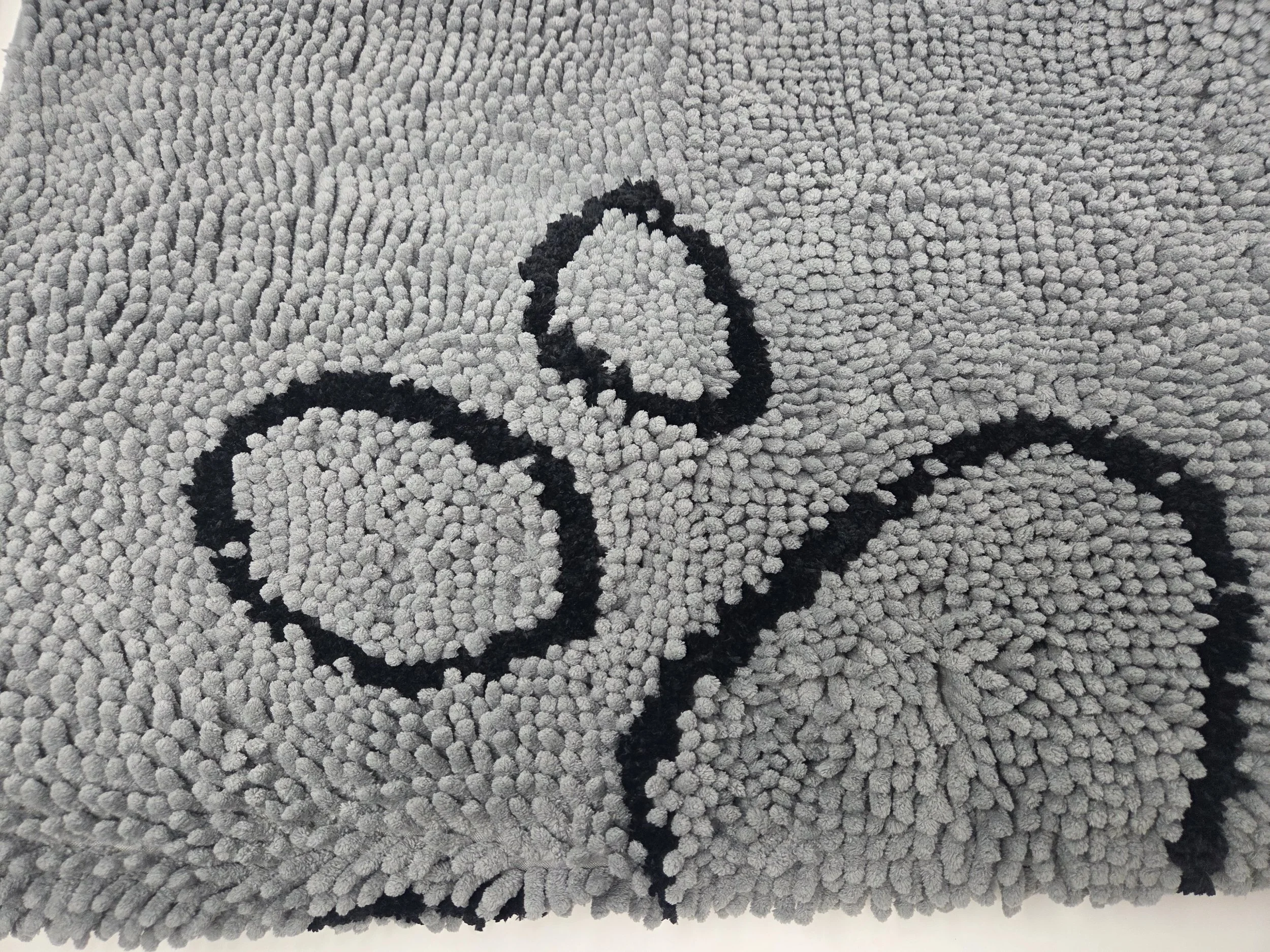 Ironstone Goldendoodles non-slip grooming mat used for puppy stability and safety during brushing sessions.