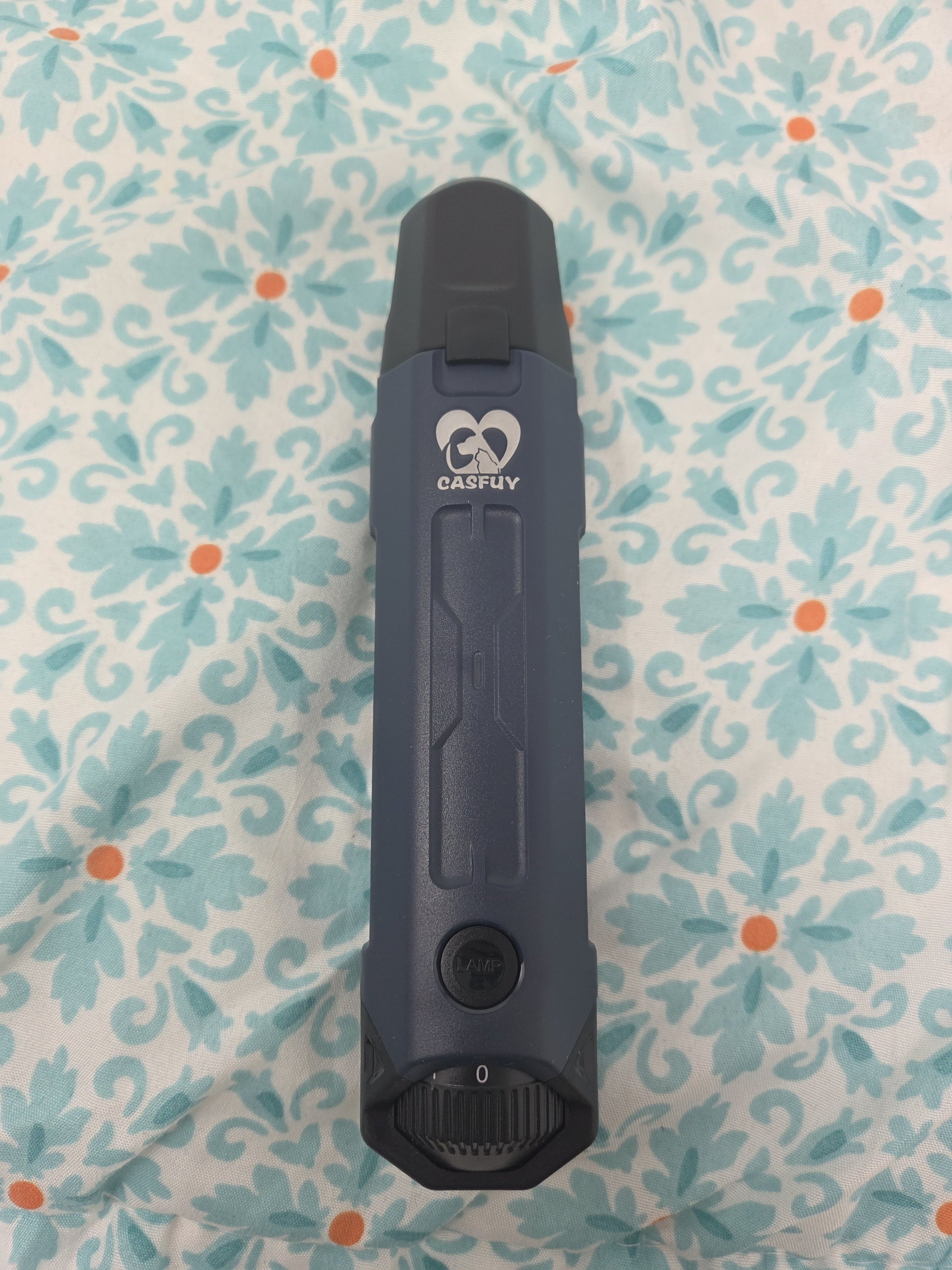 Ironstone Goldendoodles low-noise electric nail grinder for safe puppy grooming.