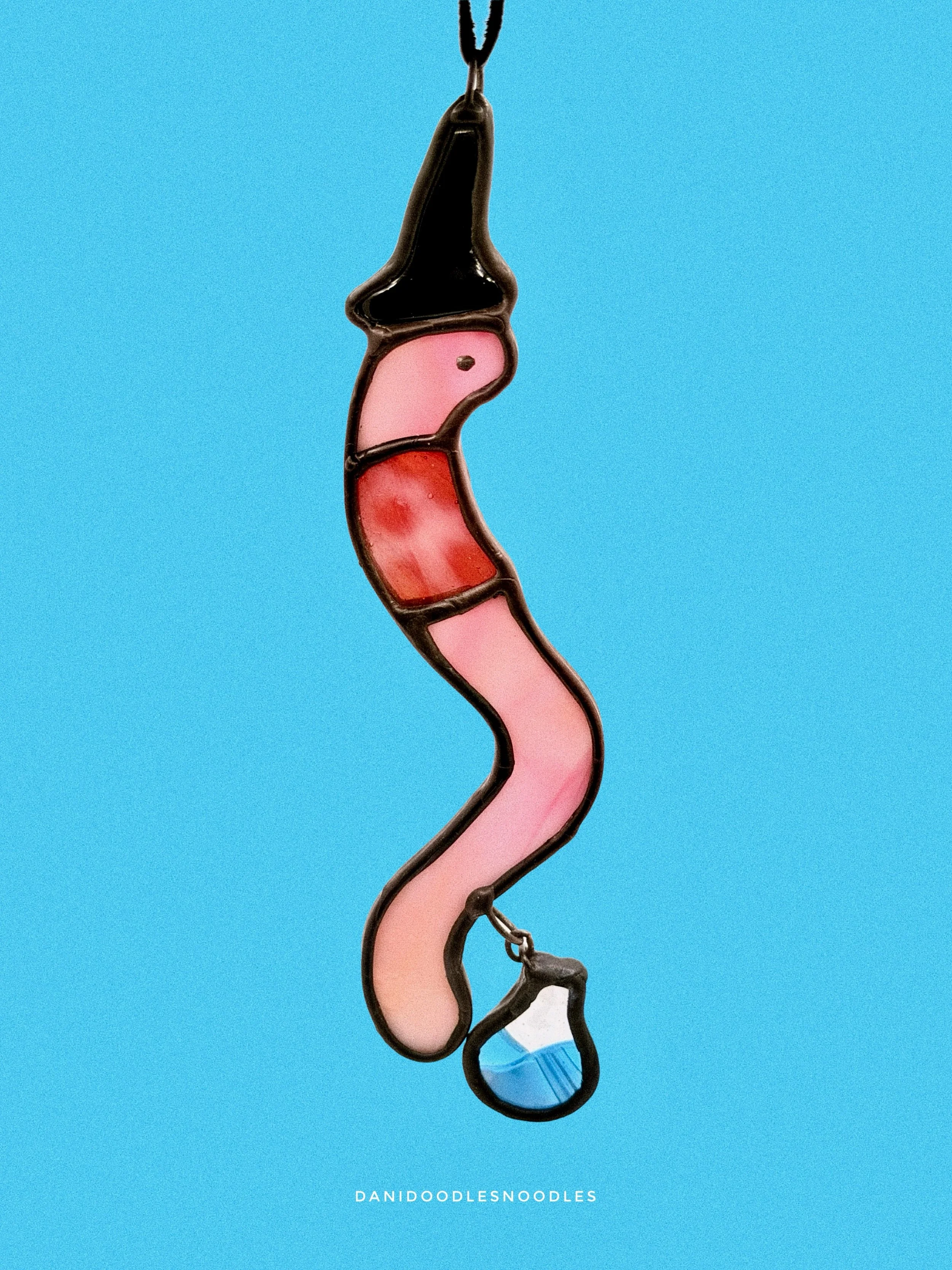 Updated photo of the ornament, &ldquo;Would you still love me if I was a worm,&rdquo; witch edition. 
(And yes, the bottle is made out of fused glass)

Photo by @ohhey.joseph