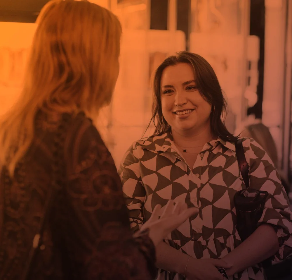 Mentor and mentee talking at a NextGEN Mentorship Program event