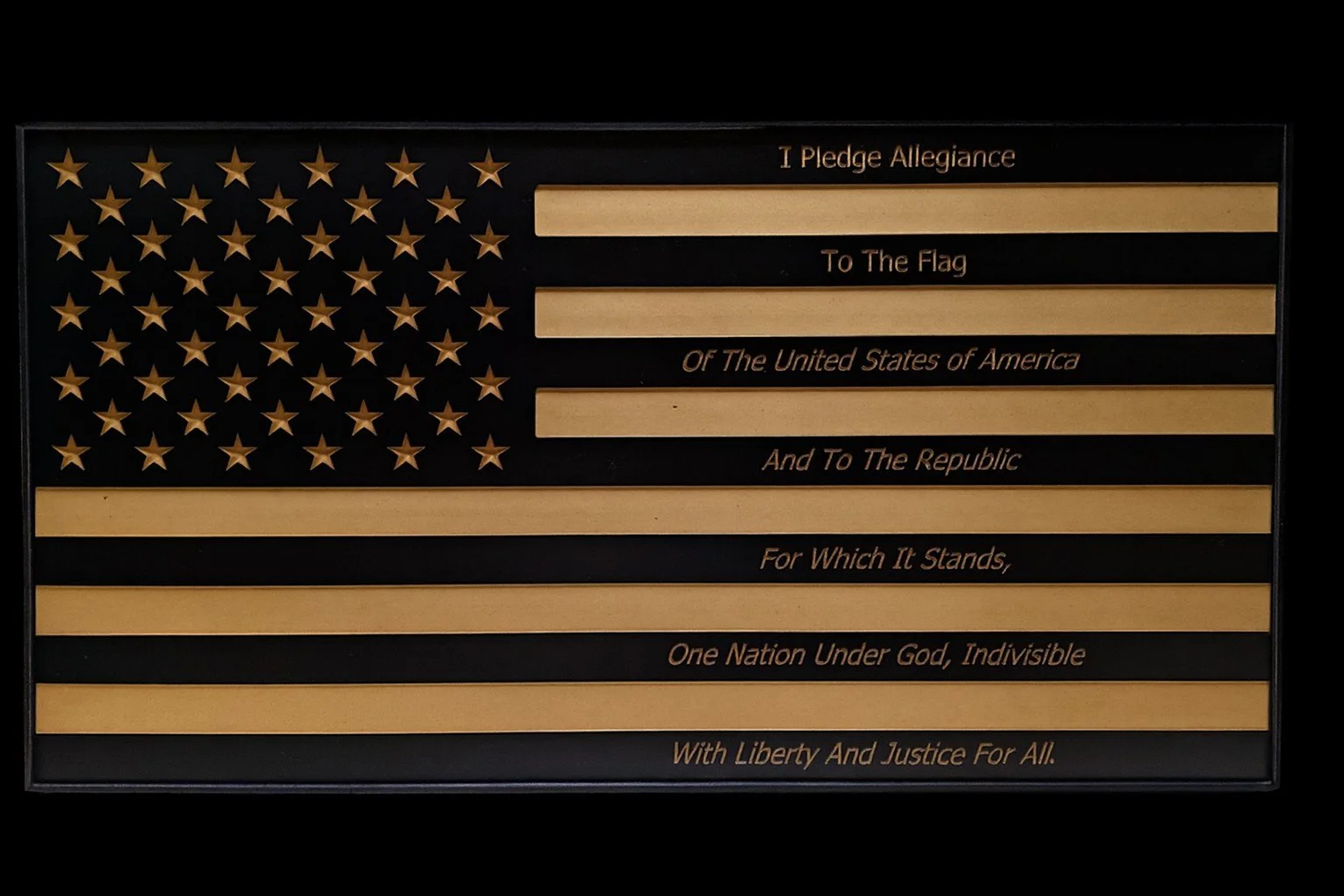 Plaque featuring the American flag with the Pledge of Allegiance written on it.