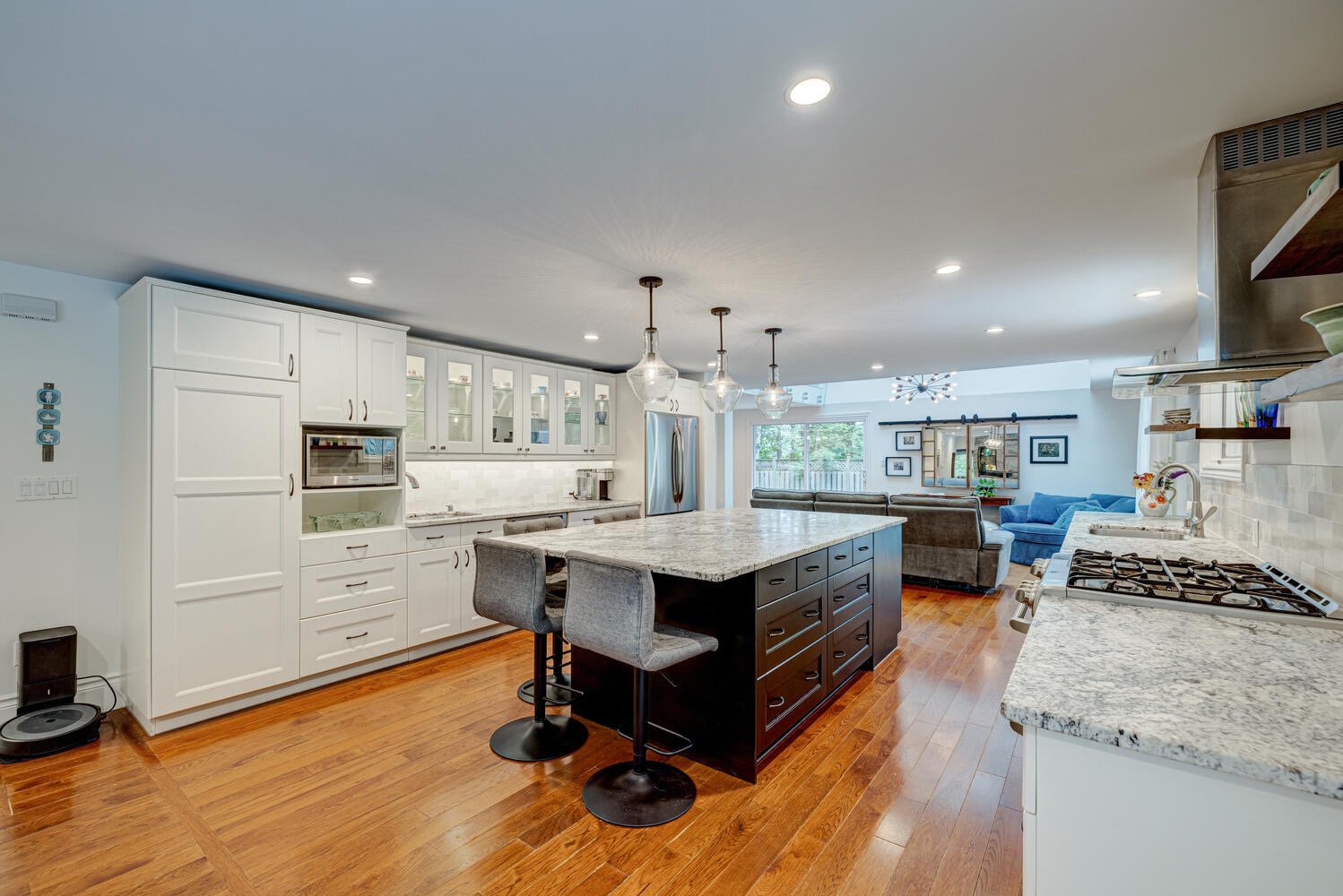 After picture of fully renovated kitchen in Komoka, Ontario, featuring modern design and upgraded appliances by Burcon Construction.