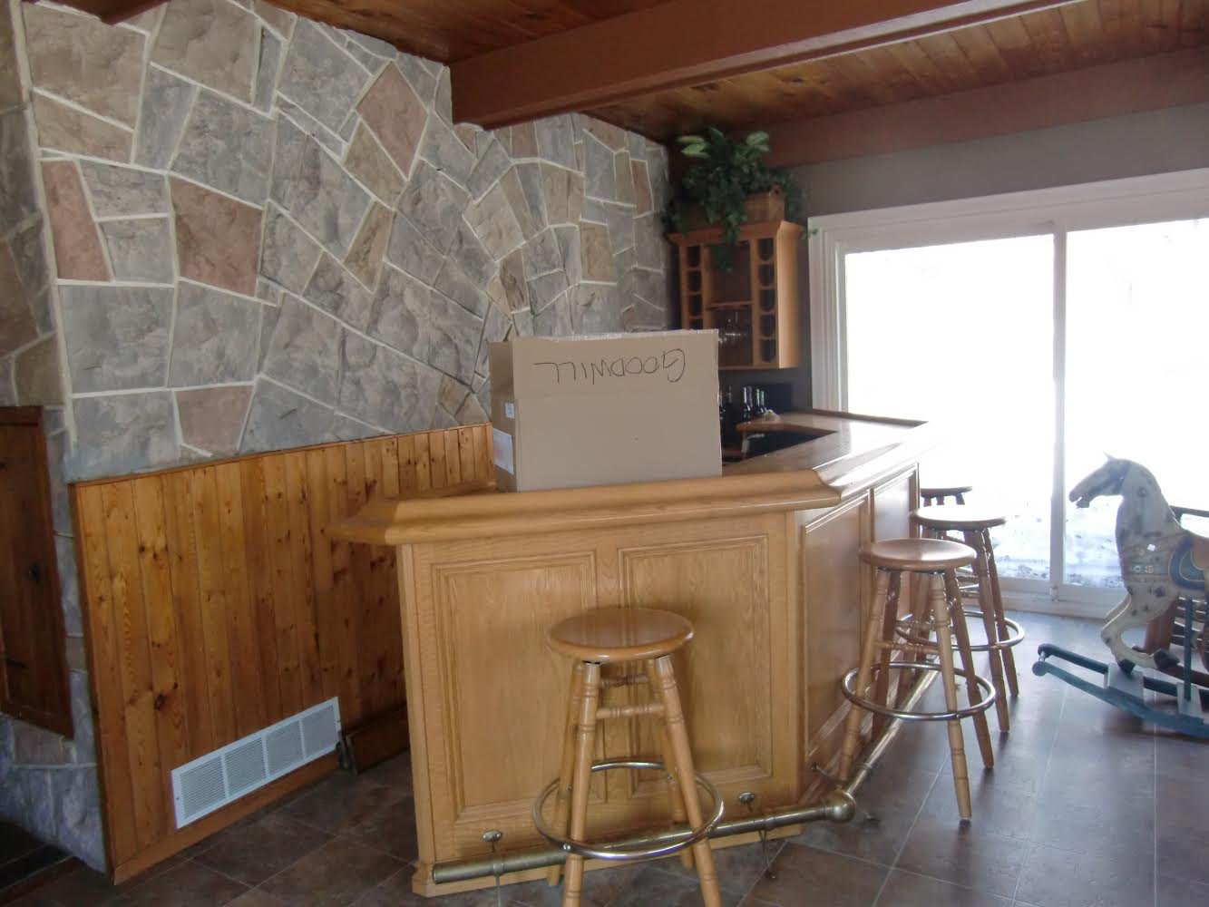 Before picture of outdated bar area in Komoka, Ontario, before renovation by Burcon Construction.