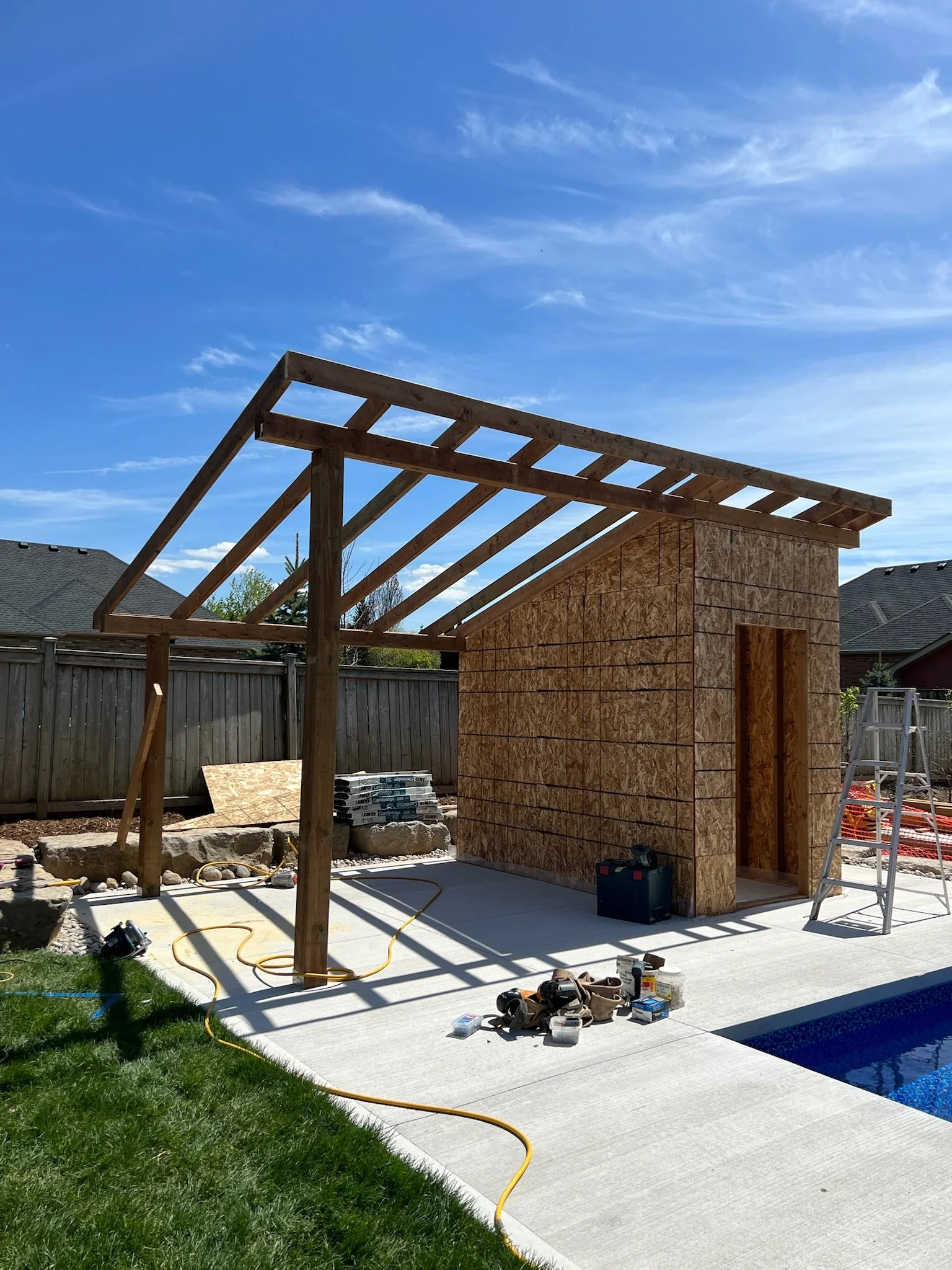 Ongoing construction of pool shed in Kilworth, featuring work in progress by Burcon Construction.