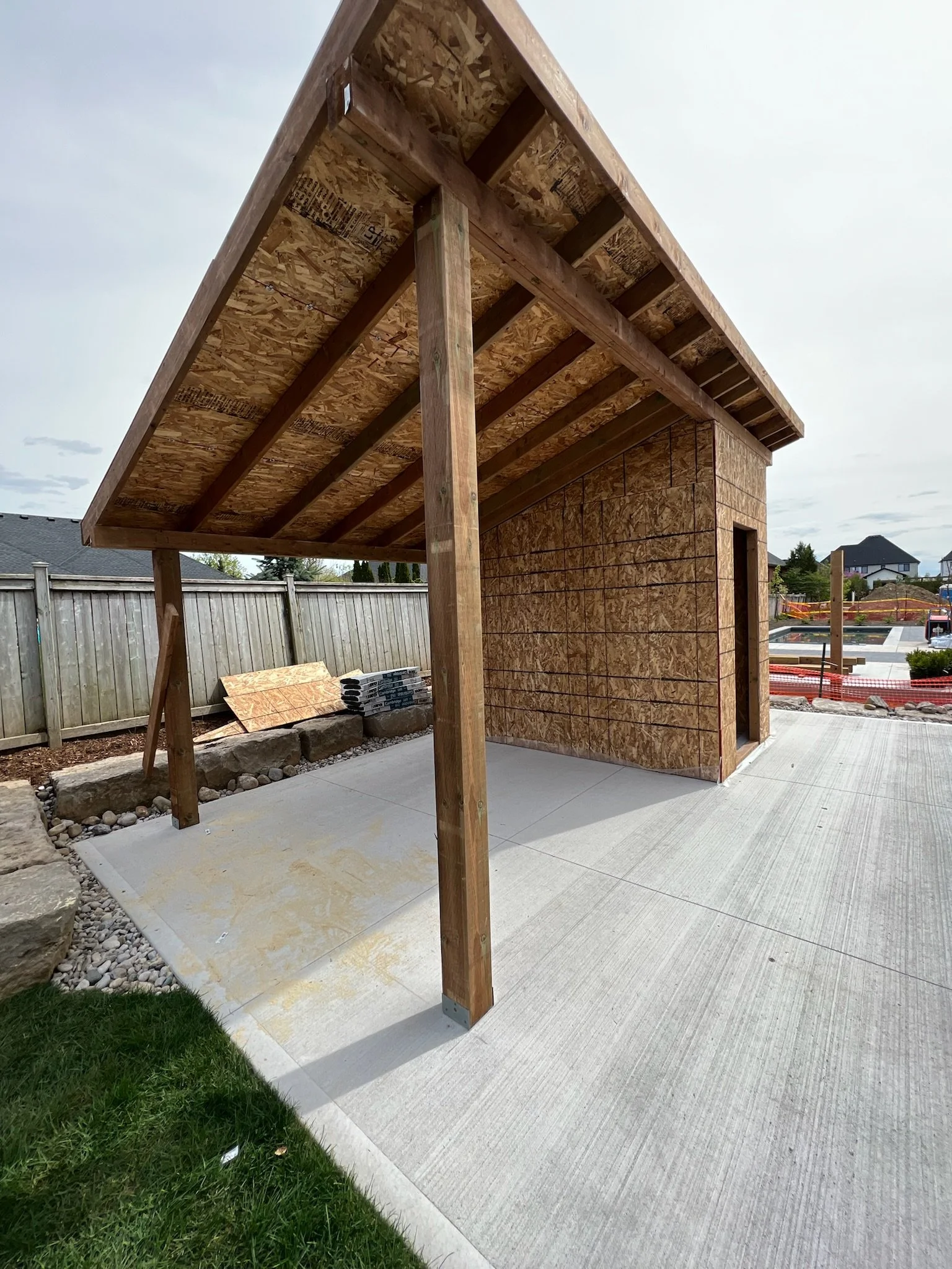 Continued construction of pool shed in Kilworth, showing structural elements and development by Burcon Construction.