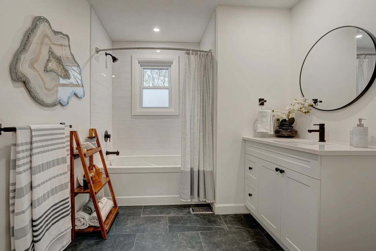 Finished bathroom renovation in Komoka by Burcon Construction, featuring modern fixtures and enhanced functionality.