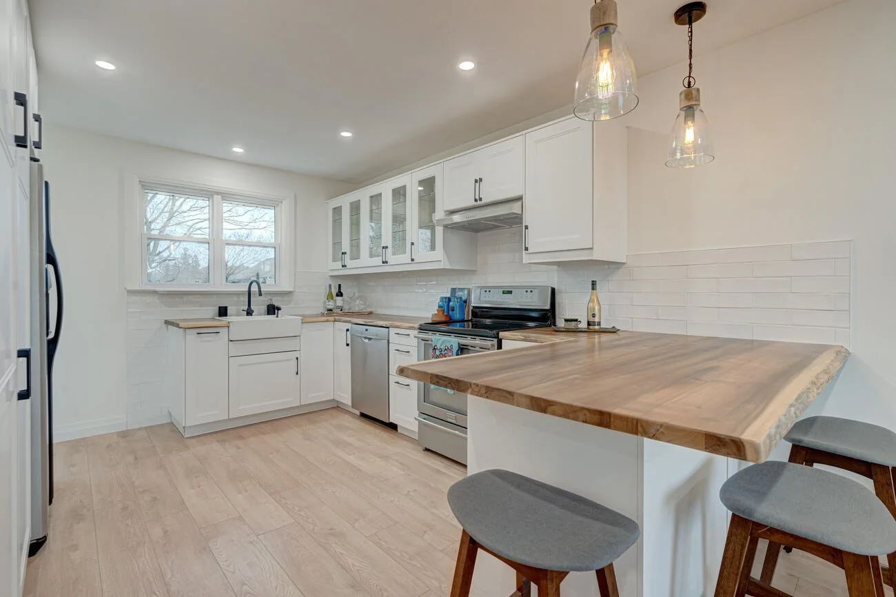 Completed kitchen renovation in Komoka by Burcon Construction, showcasing custom-built cabinets and modern design.