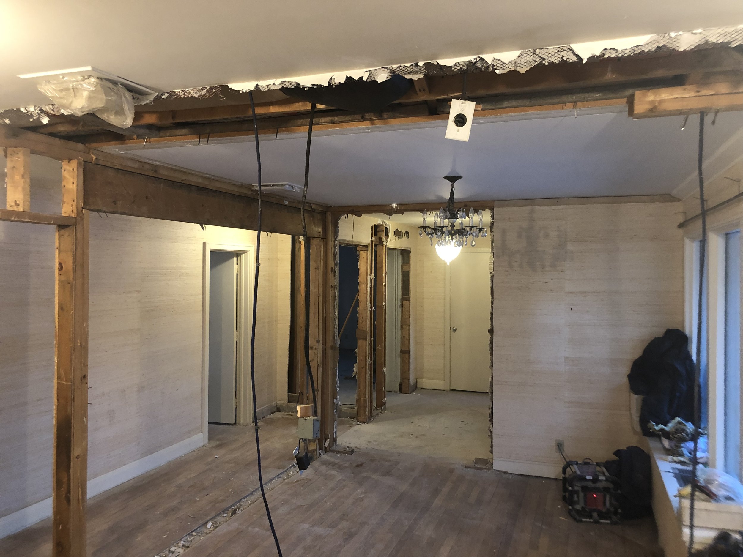 Before picture of unfinished basement in London prior to renovation by Burcon Construction, illustrating the area before transformation.