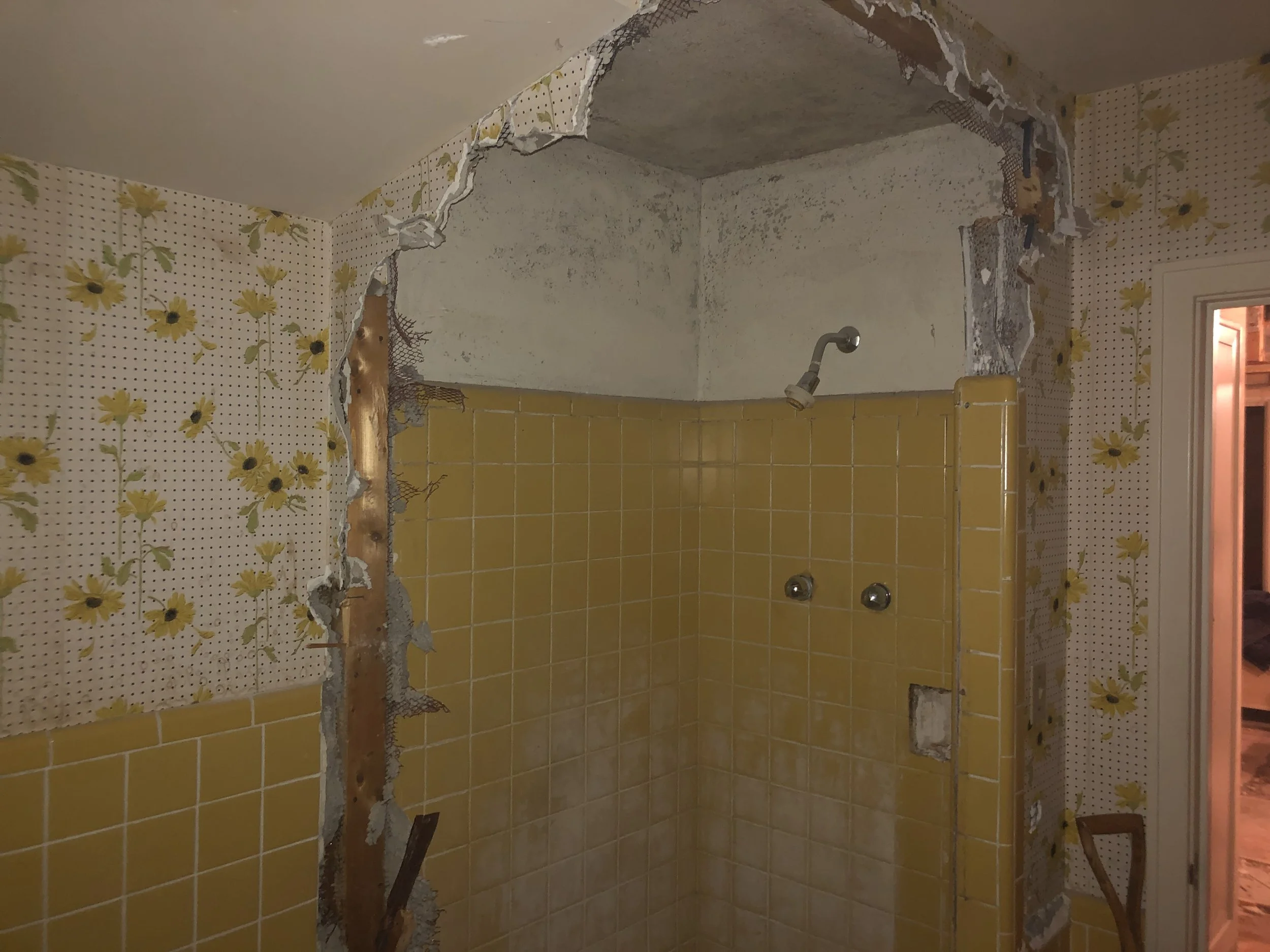 Before picture of old bathroom in basement in London prior to renovation by Burcon Construction, highlighting the need for improvement.