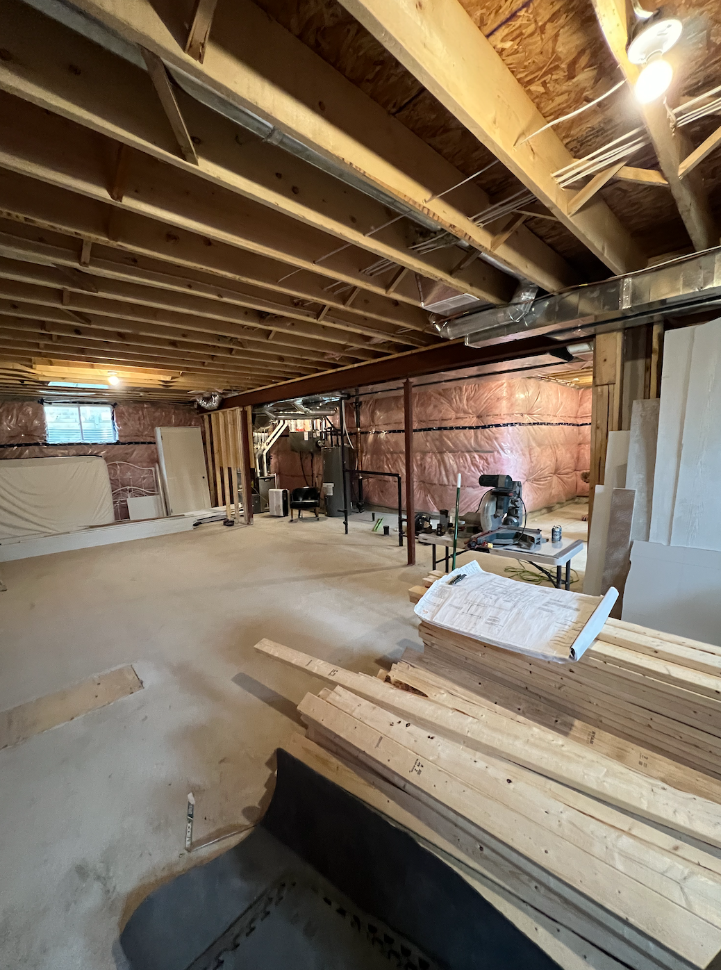 Before picture of unfinished basement in Komoka prior to renovation by Burcon Construction, showing the area designated for the bar.
