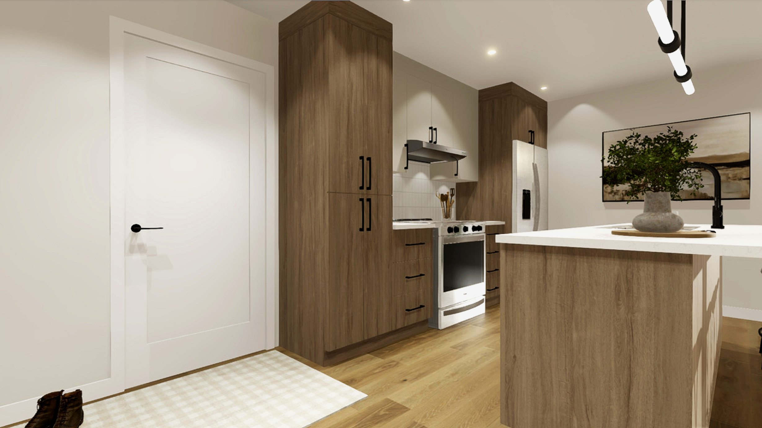 Cuisine moderne avec armoires en bois clair, un îlot central avec vasque et plante verte, plancher en bois, murs blancs, éclairage encastré, tableau au mur.