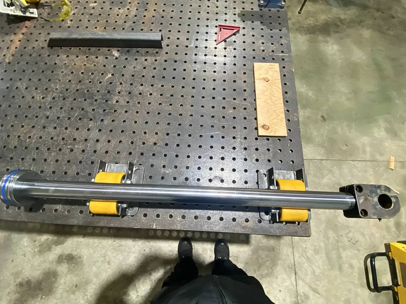 Custom machined hydraulic stem manufactured from 4140 hardened chrome rod for a Hino dump truck