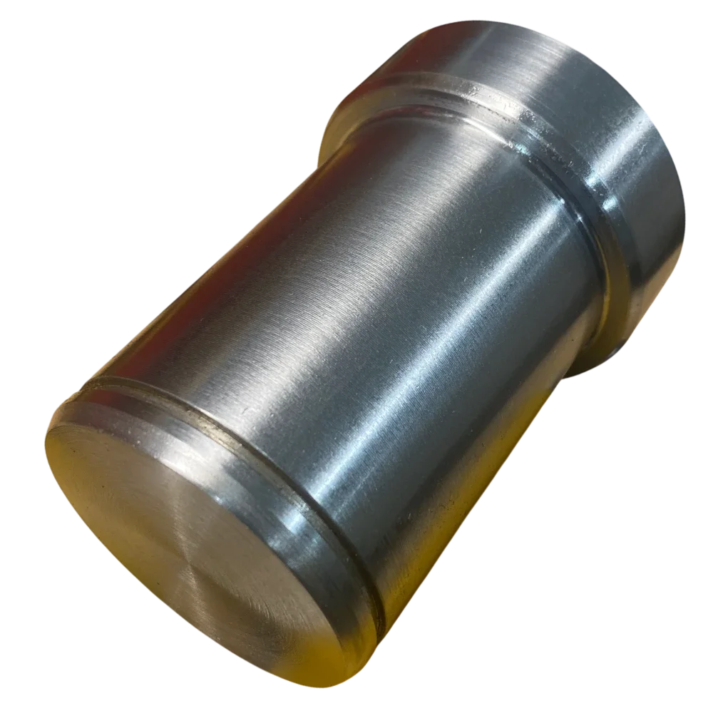 Close-up of a metallic cylindrical object with a smooth, shiny surface, isolated on black background.