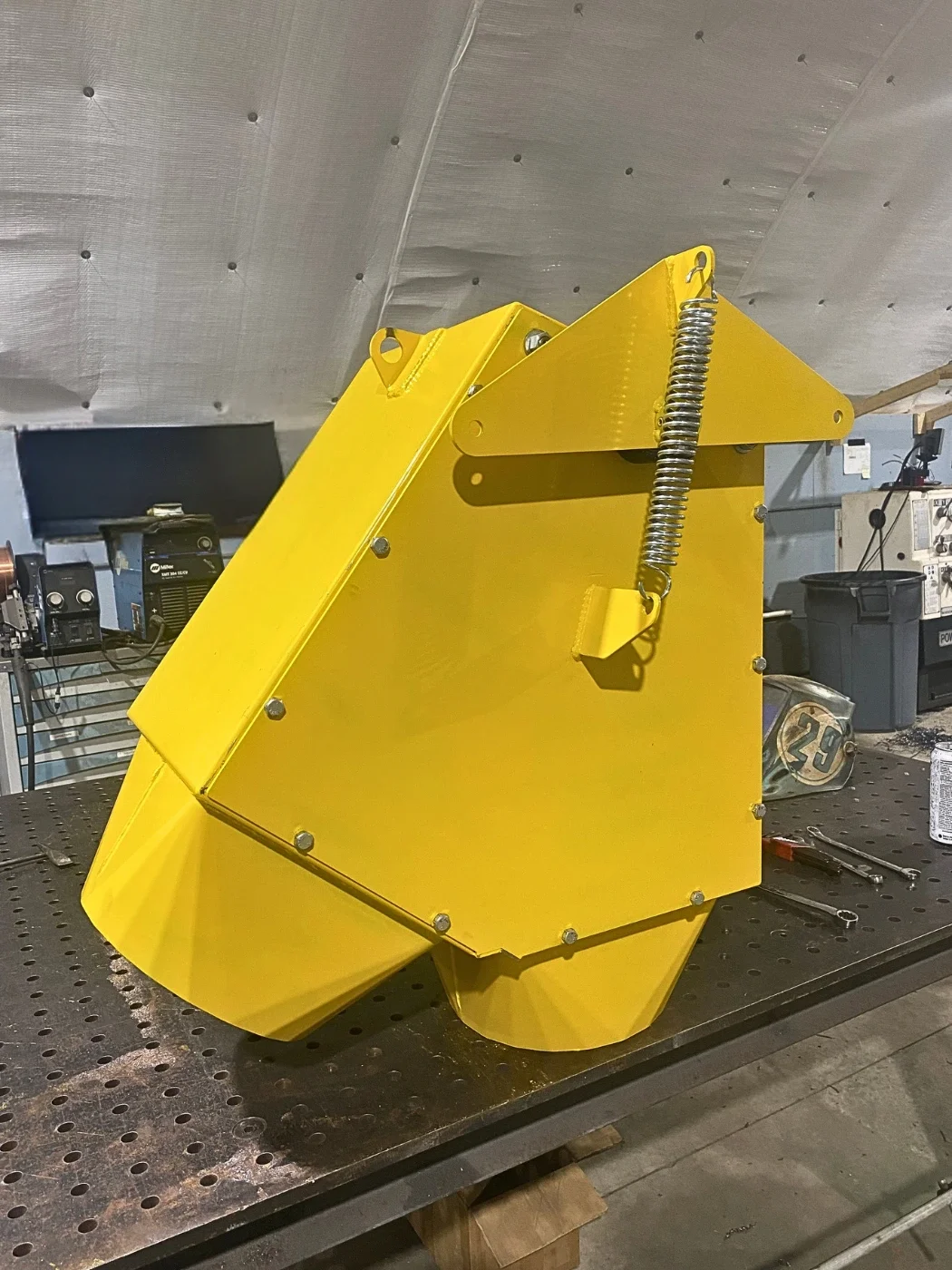 Custom steel Y valve grain diverter manufactured for agricultural grain handling equipment.