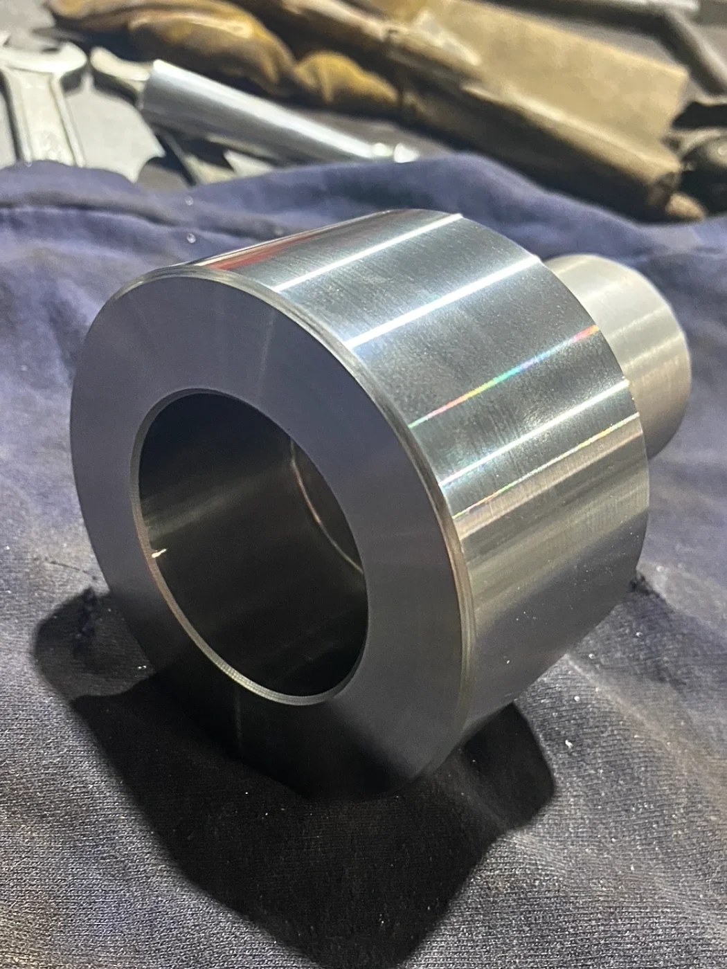 Custom machined 1018 steel shaft extension manufactured to restore proper shaft engagement and alignment in a mechanical system.