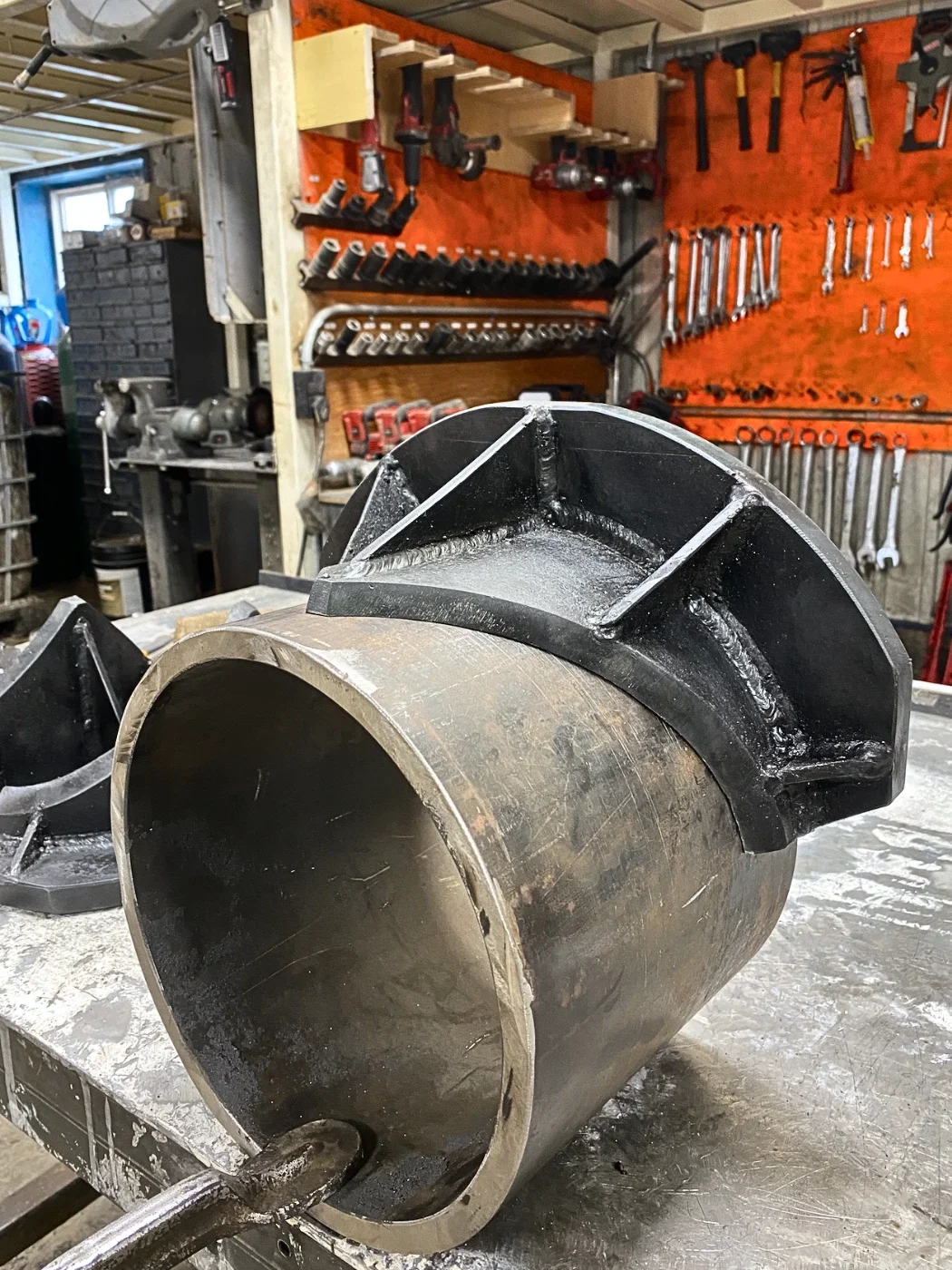Custom-machined hydraulic shear point manufactured for industrial hydraulic equipment repair and replacement.