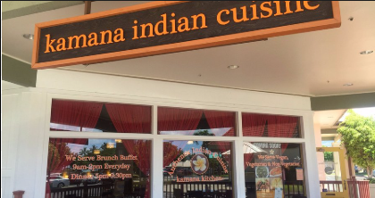 Exterior front of Kamana Indian Cuisine restaurant with signage and windows