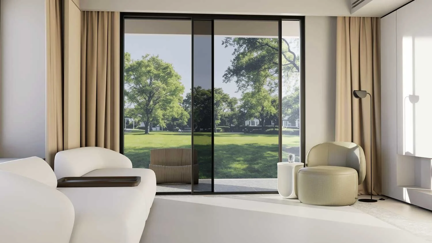 Living room with large sliding glass door overlooking trees and a park